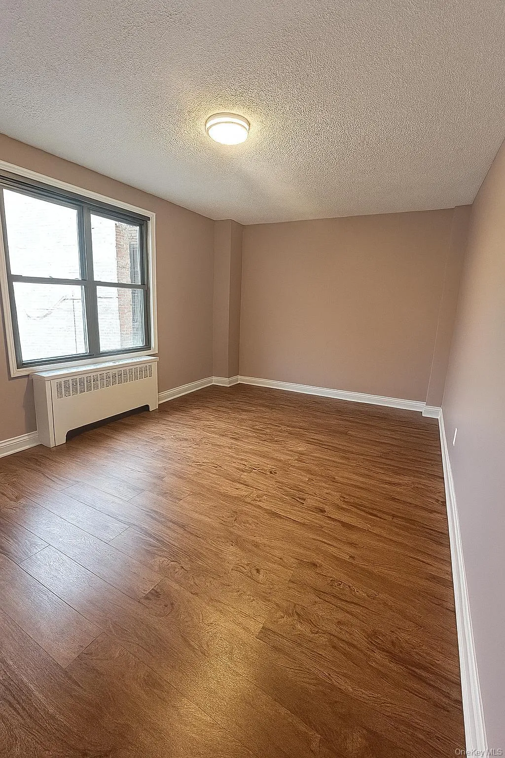 Bedroom with wood finished floors. Bedroom with wood finished floors.