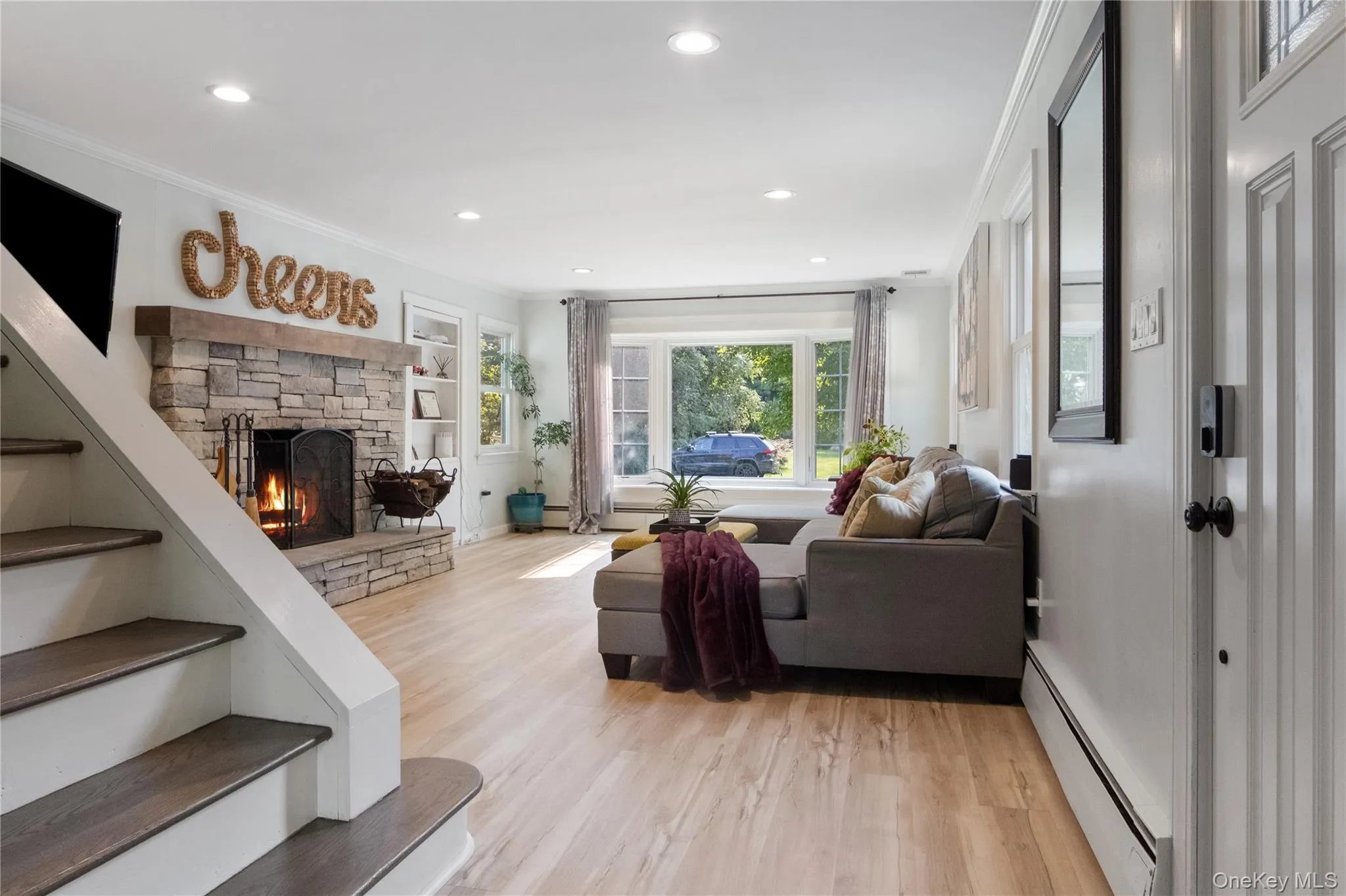 Welcome Home. Curl up in front of the wood-burning cultured stone fireplace. The bay window offers views of the front flower garden where you can watch the butterflies play on the bushes outside. Welcome Home. Curl up in front of the wood-burning cultured stone fireplace. The bay window offers views of the front flower garden where you can watch the butterflies play on the bushes outside.