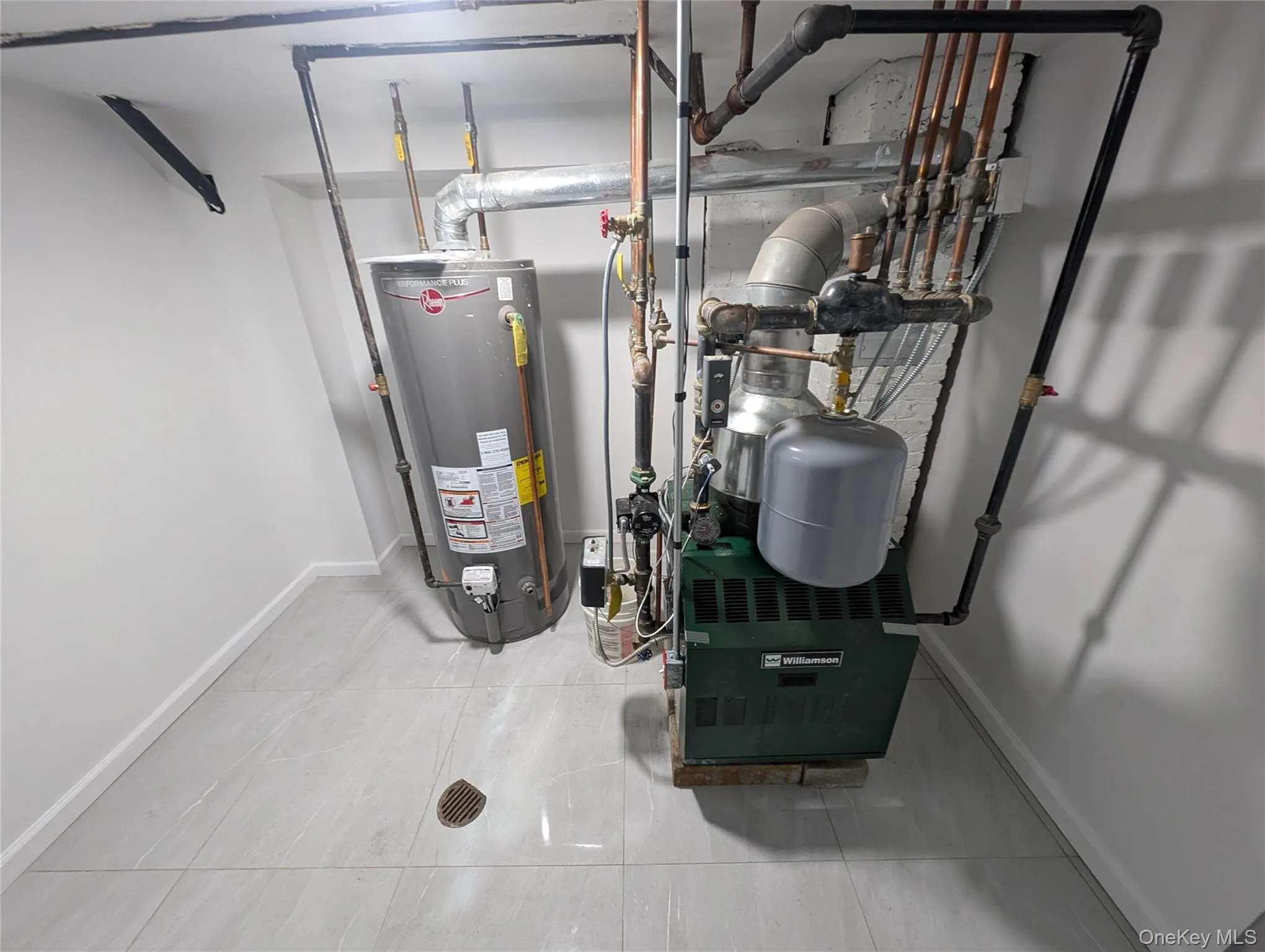 Utilities with water heater and a heating unit Utilities with water heater and a heating unit