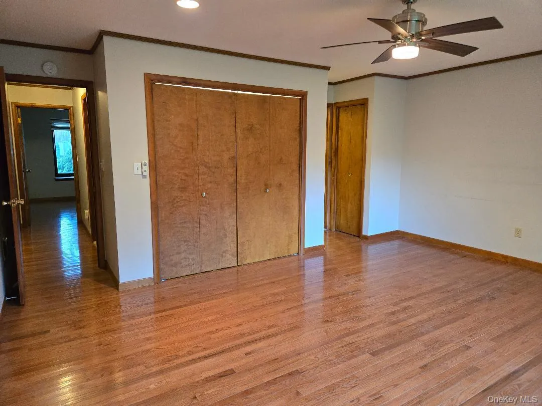 Wait till you walk into this Primary Suite! You'll marvel at the size of this room. Large enough to fit a California King plus large furniture as well! The stunning hardwood flooring will amaze you. View of the very large closet as well as the smaller one on the side. Wait till you walk into this Primary Suite! You'll marvel at the size of this room. Large enough to fit a California King plus large furniture as well! The stunning hardwood flooring will amaze you. View of the very large closet as well as the smaller one on the side.