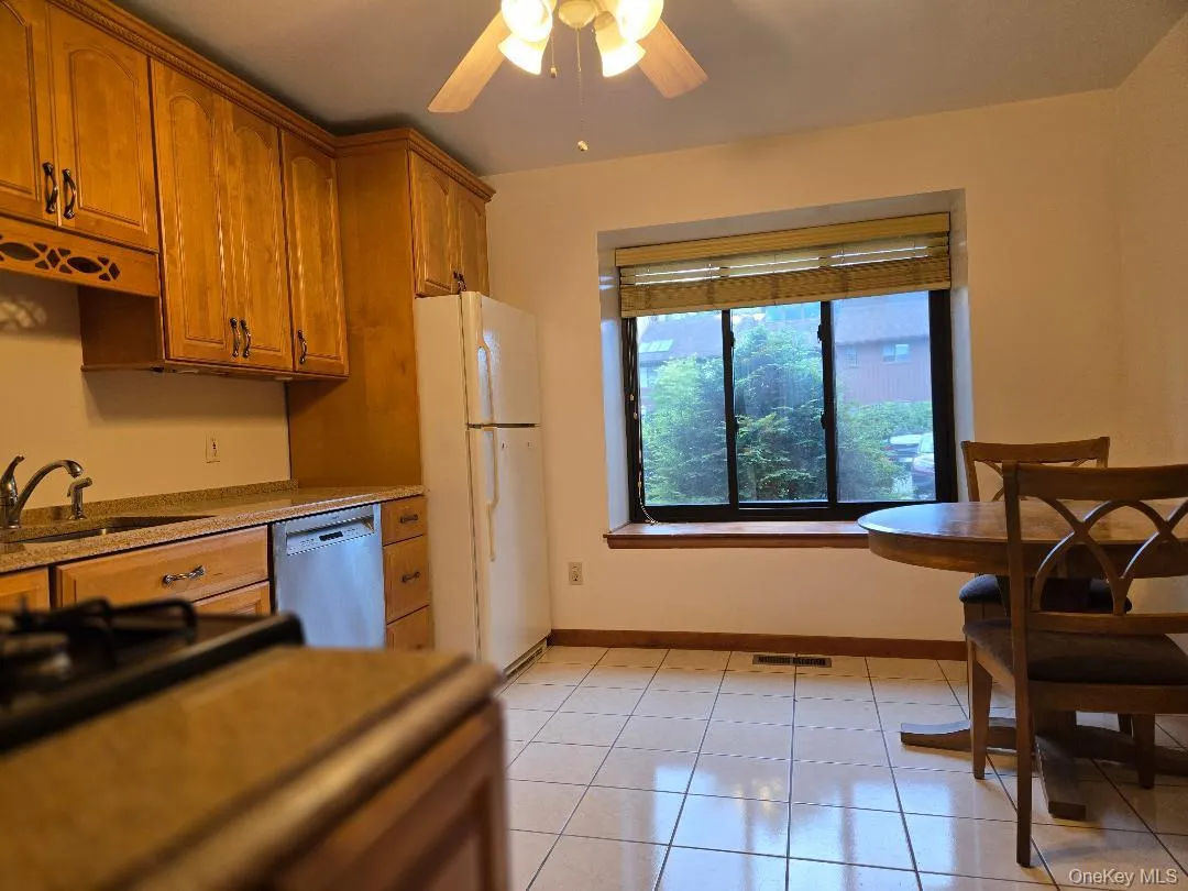 Another view of the very large kitchen showing the large window & eat-in-area.. Another view of the very large kitchen showing the large window & eat-in-area..