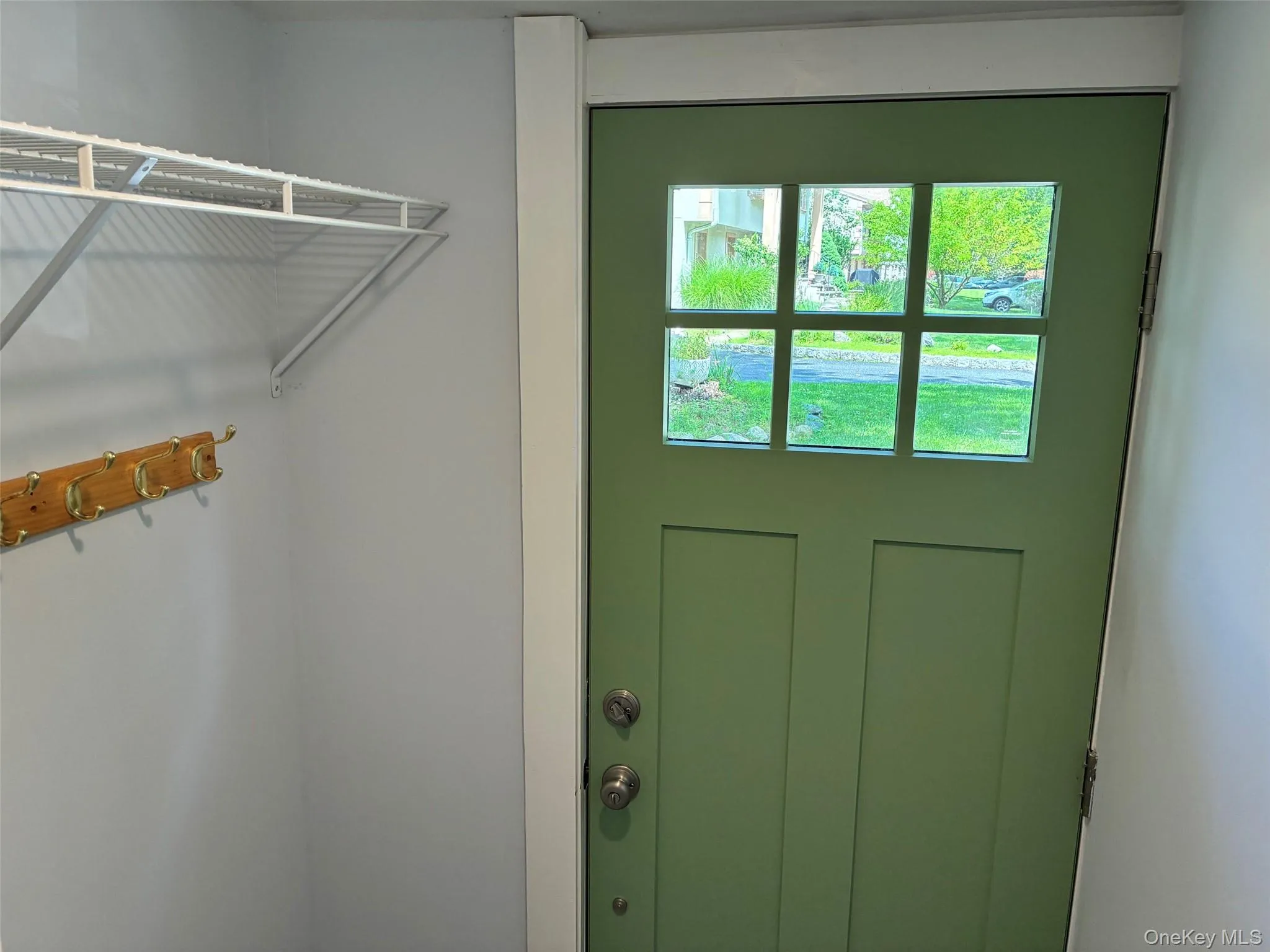 Front entry off driveway with mudroom and storage Front entry off driveway with mudroom and storage