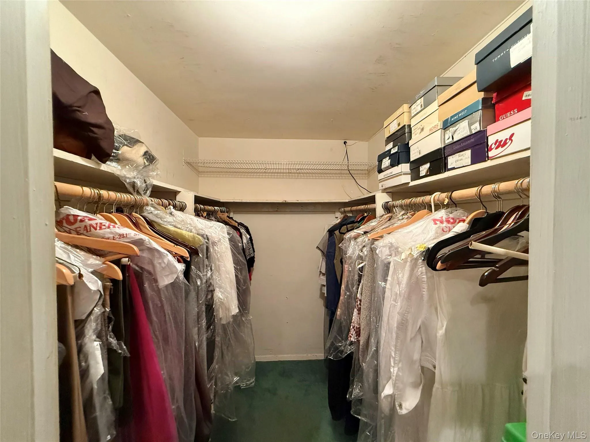 Primary bedroom walk in closet Primary bedroom walk in closet