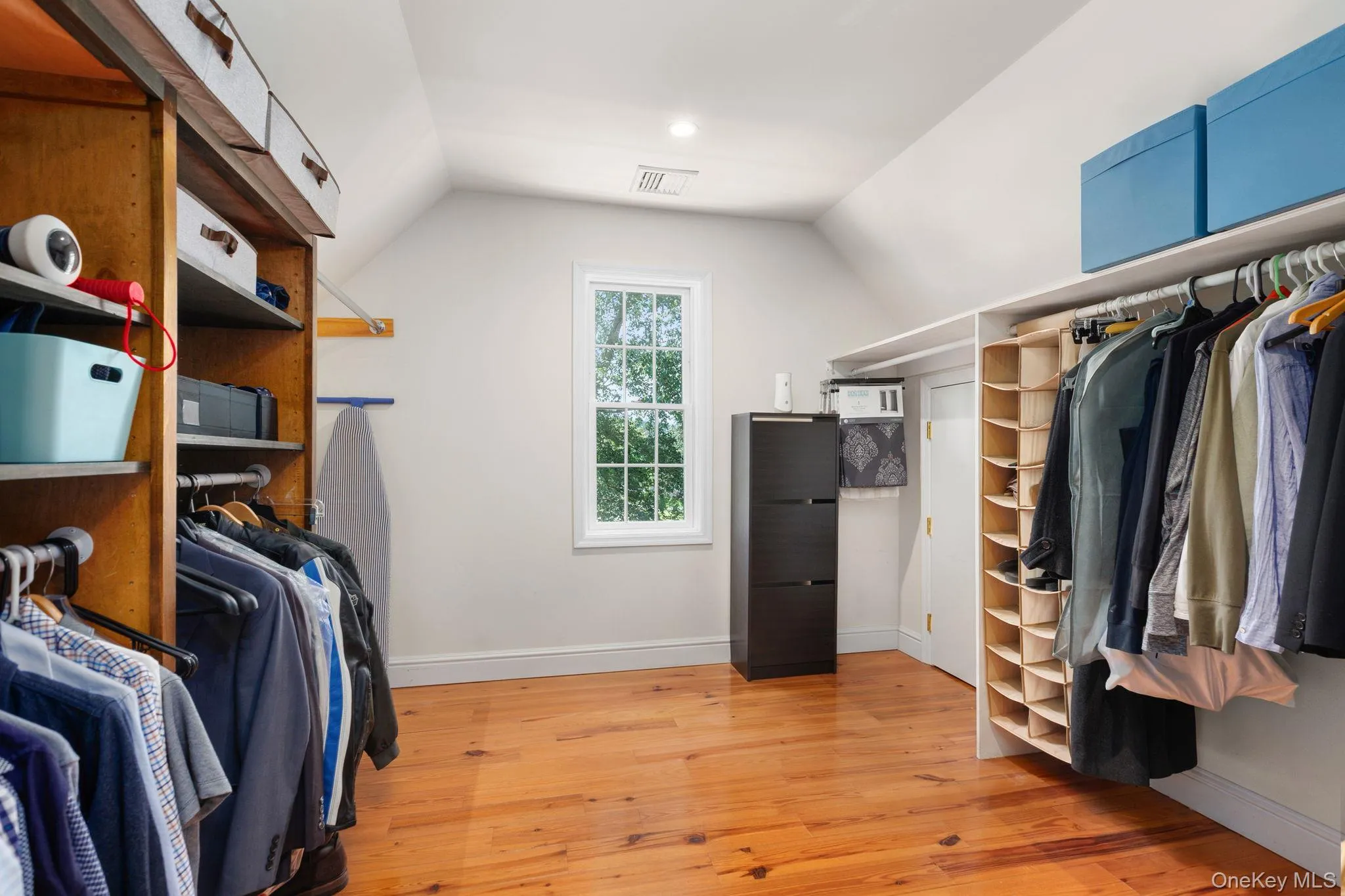 Large primary bedroom walk in closet. Large primary bedroom walk in closet.