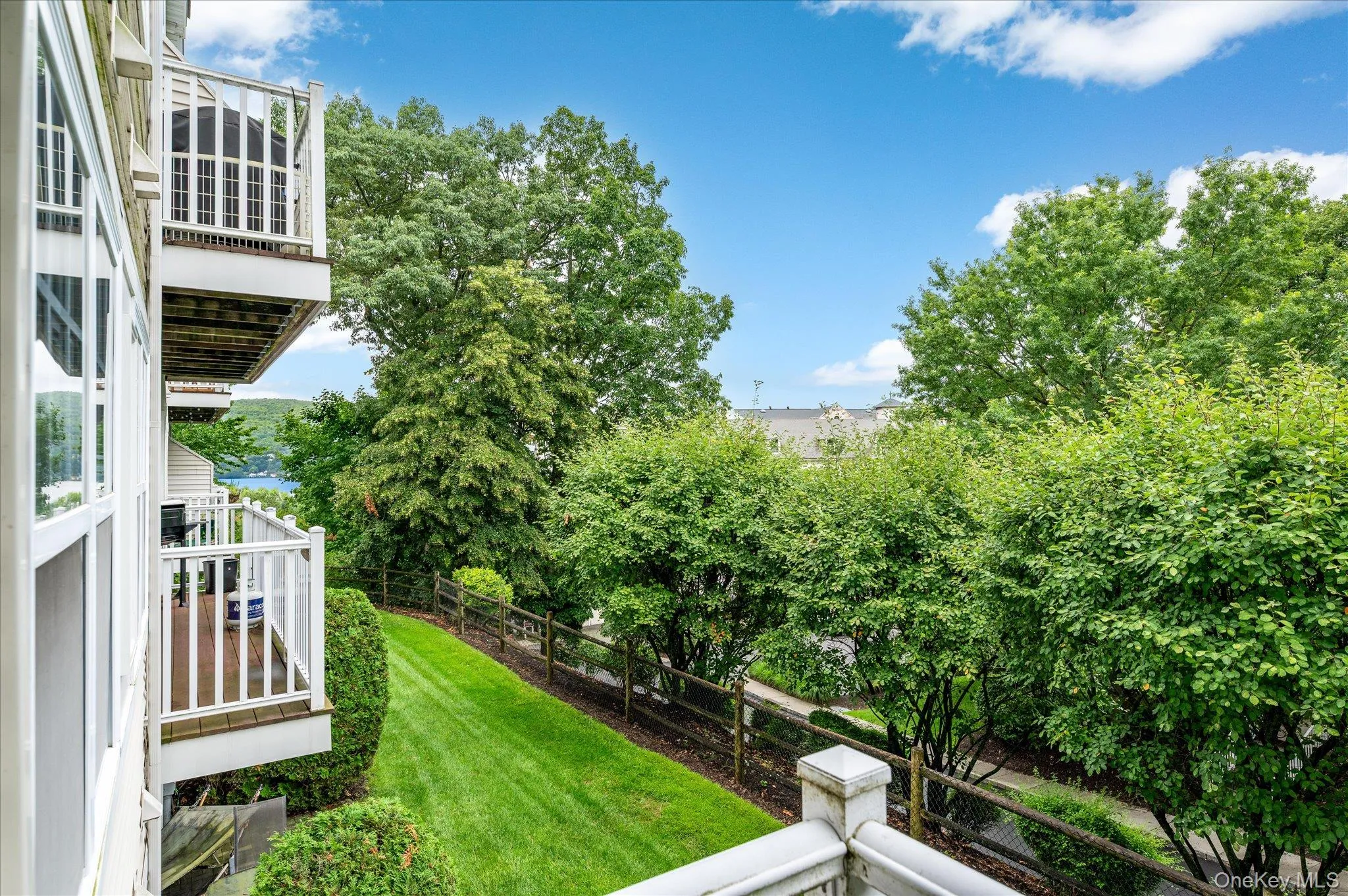 Porch on main level offers a partial view of the Hudson River Porch on main level offers a partial view of the Hudson River