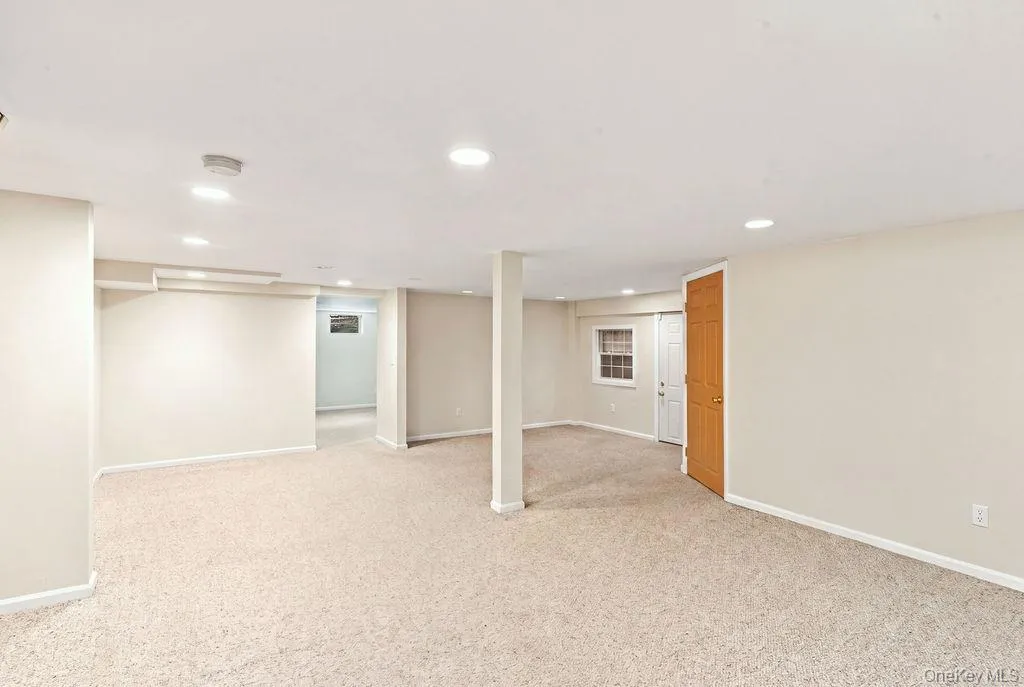 Recessed lighting and neutral wall tones. Outside Entrance Recessed lighting and neutral wall tones. Outside Entrance