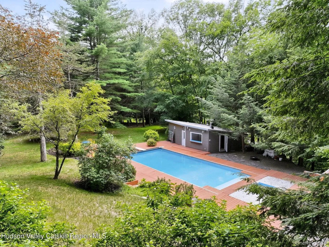 With view of pool house With view of pool house