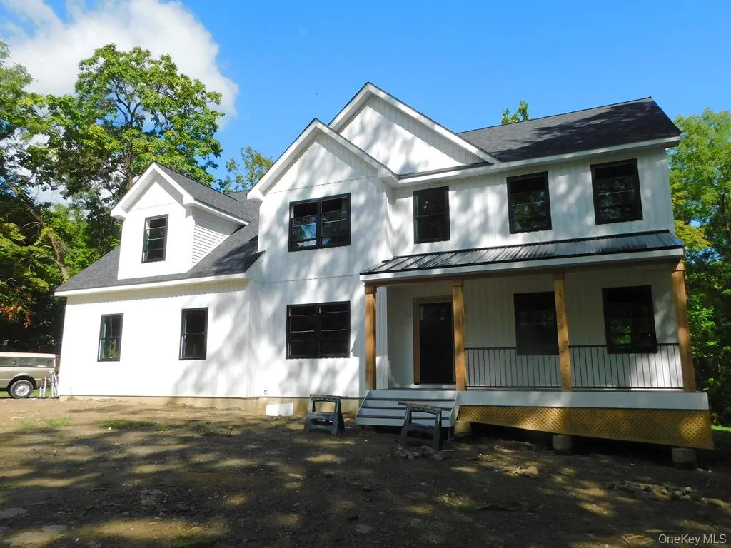 Front exterior and porch Front exterior and porch