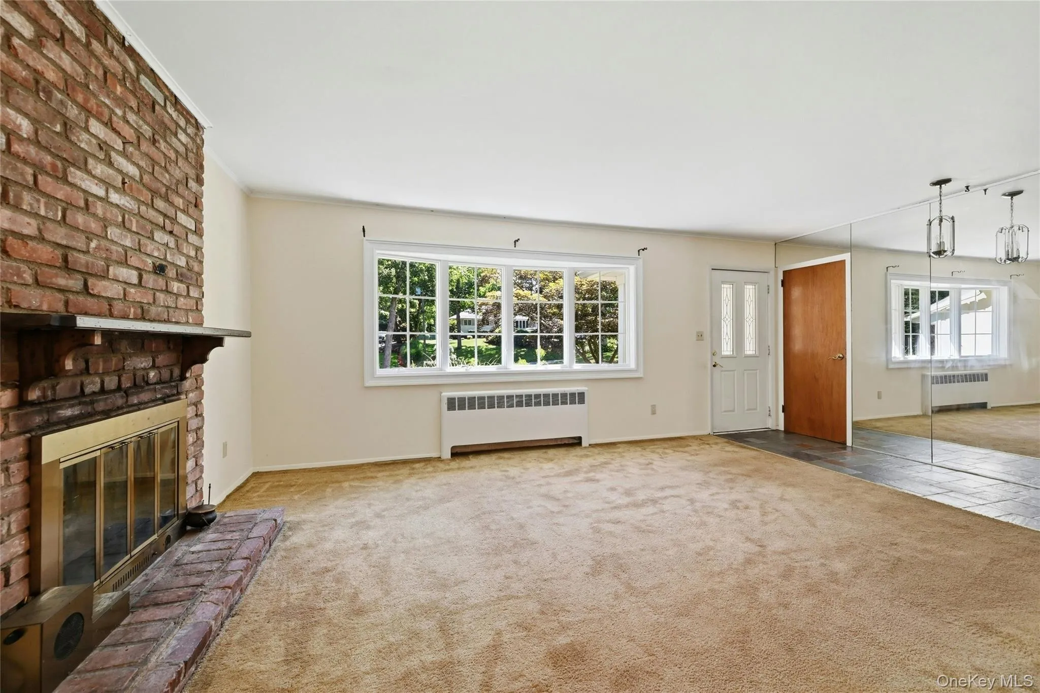 Living room with view to the front entry Living room with view to the front entry