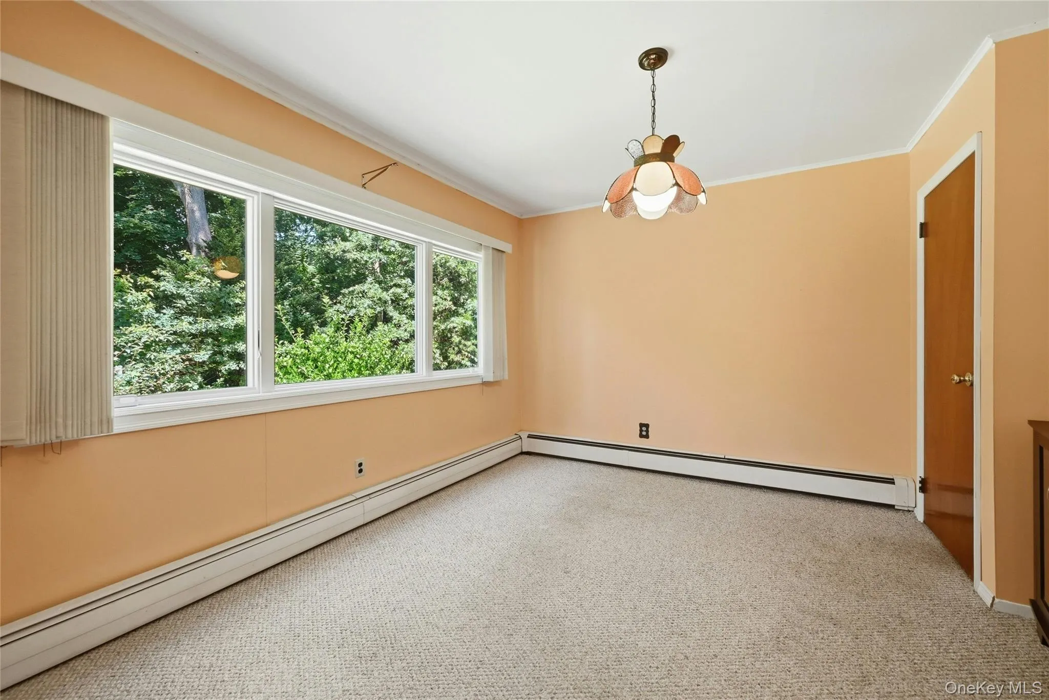 Den with access to side entrance and basement stairs Den with access to side entrance and basement stairs