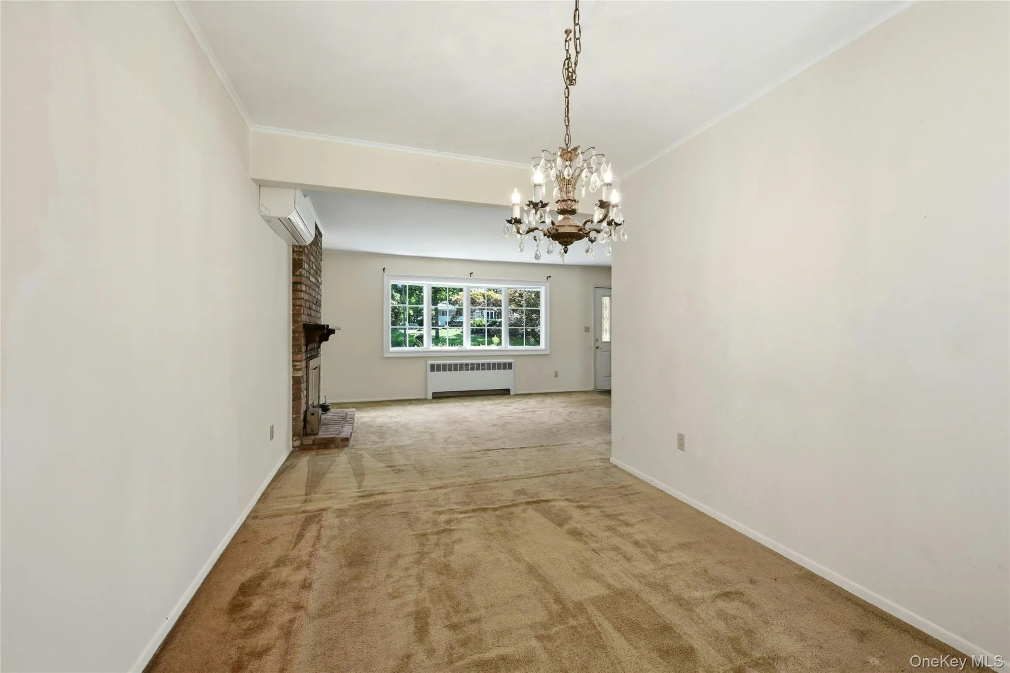 Formal dining room with view of the living room Formal dining room with view of the living room