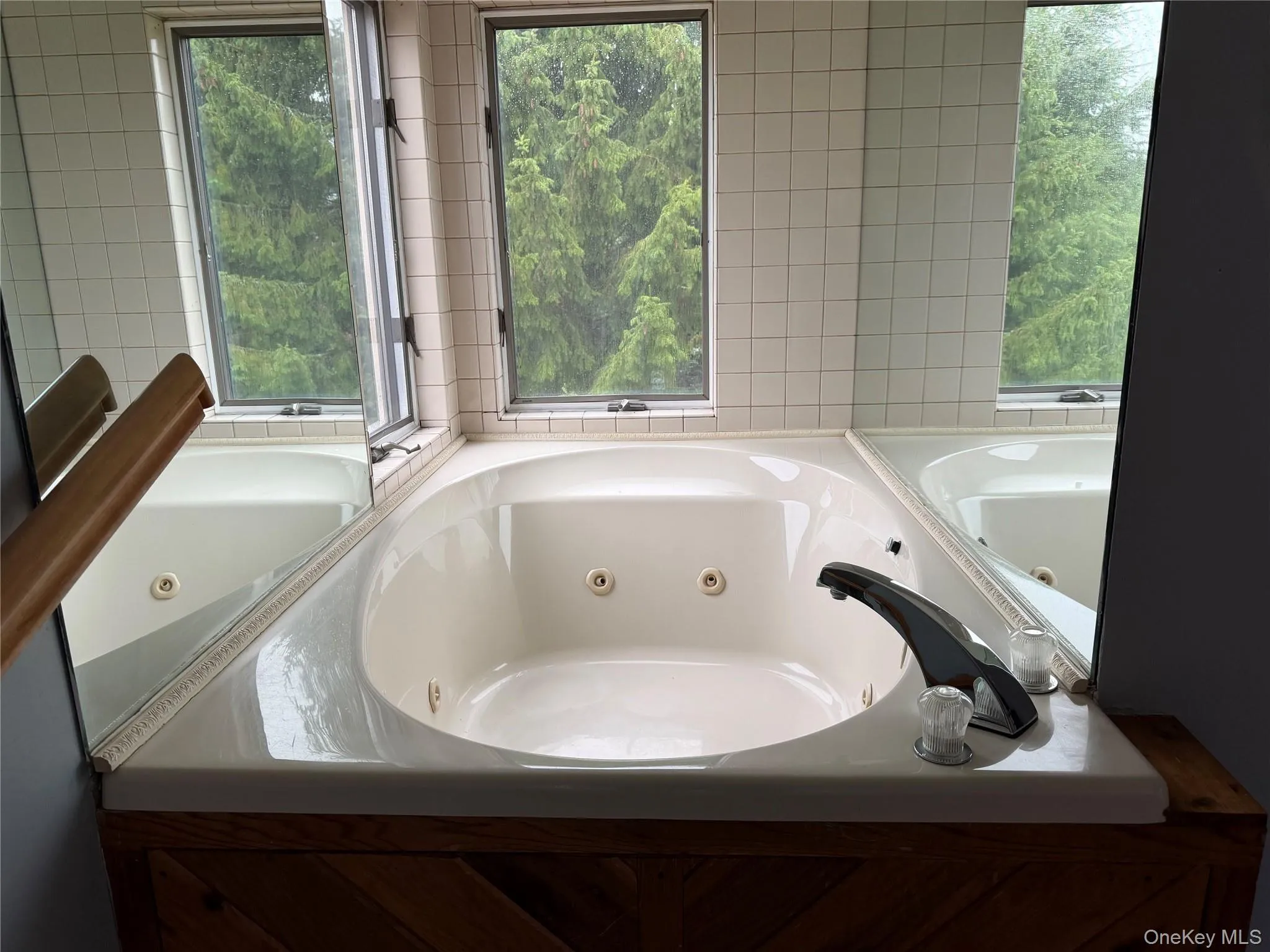 Off of bedroom primary. Sit in the jetted tub and look out at the view! Off of bedroom primary. Sit in the jetted tub and look out at the view!