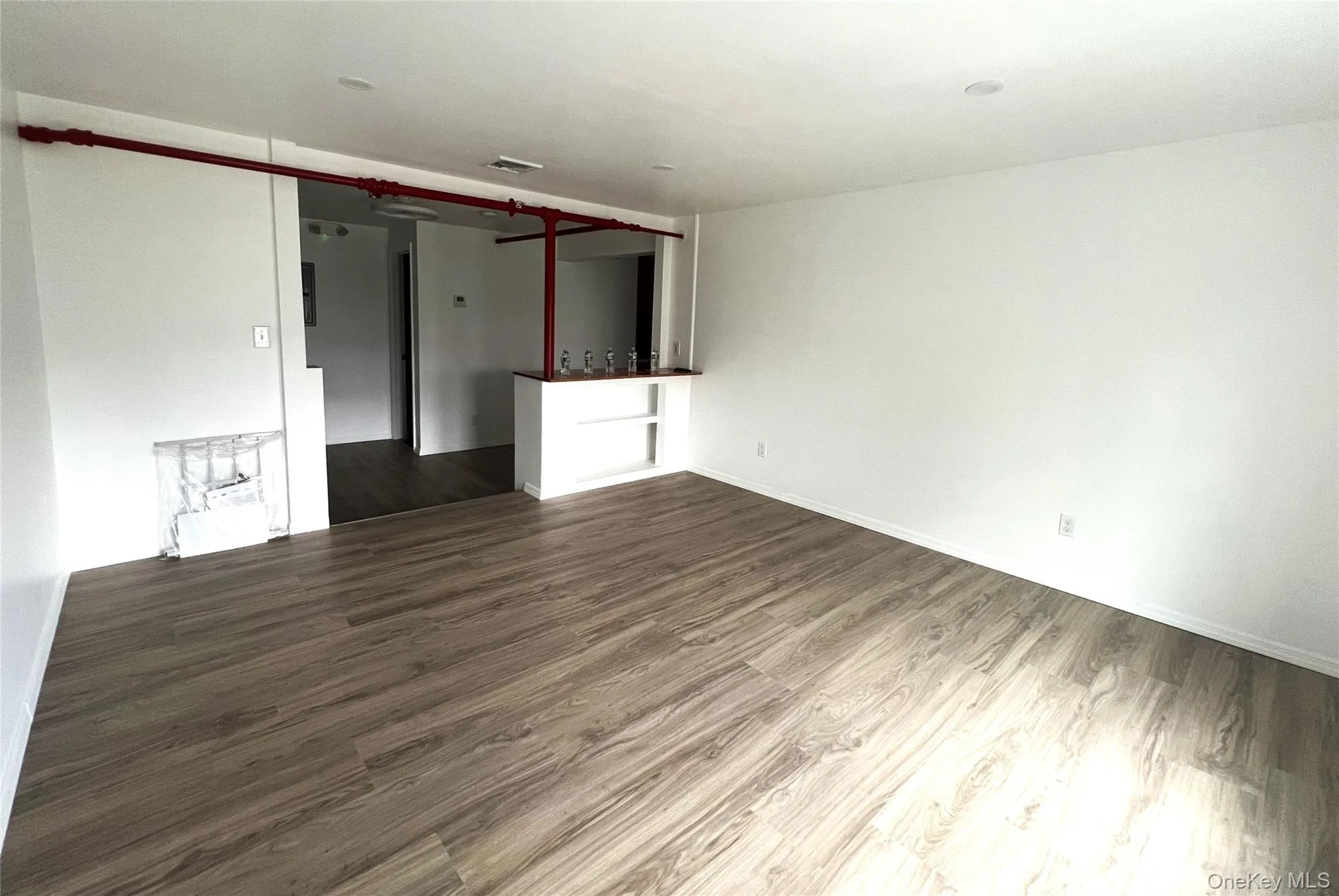 Spacious Living Room has Built-In Shelves. Spacious Living Room has Built-In Shelves.