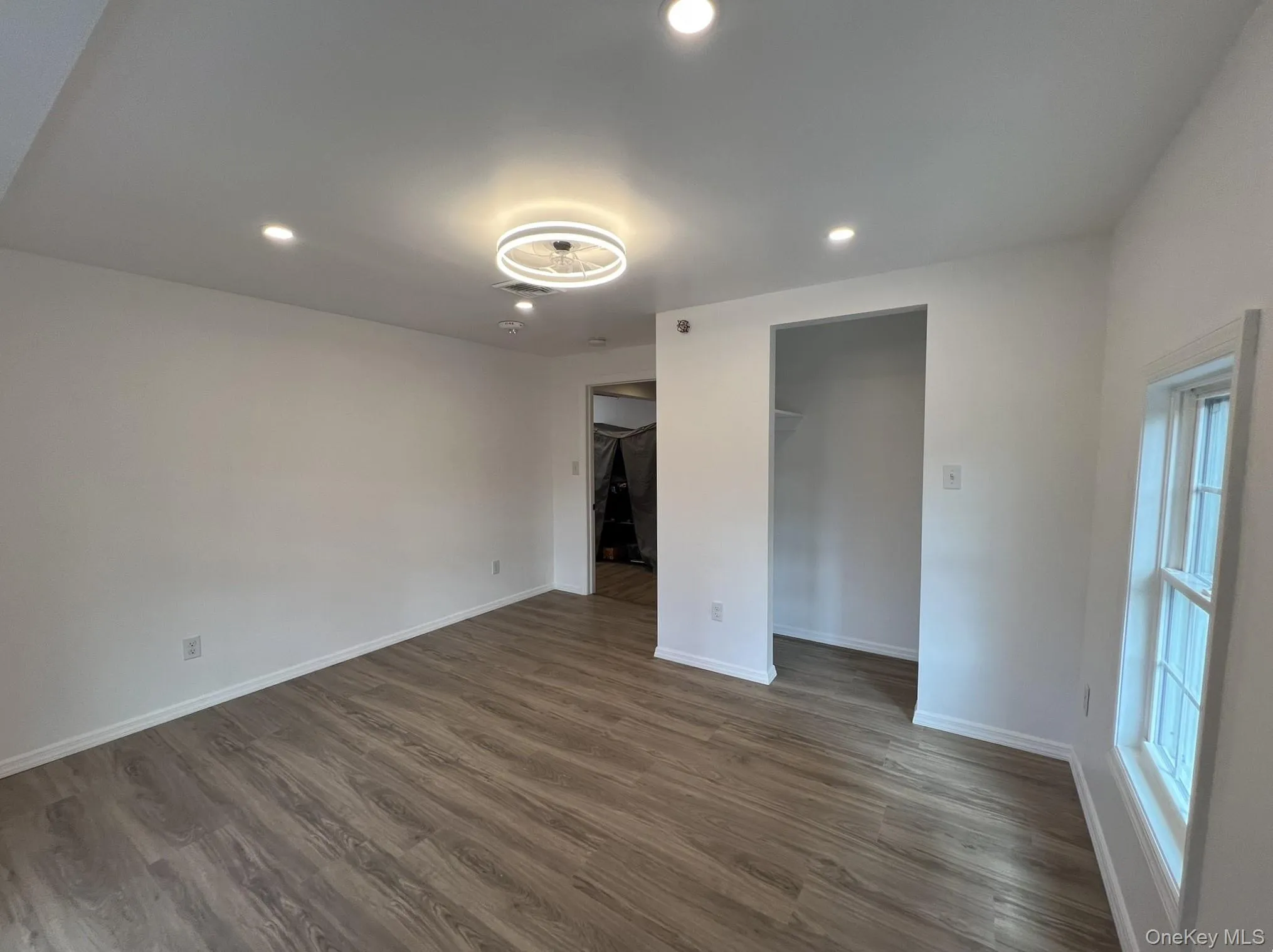 2nd Bedroom with open closet area. 2nd Bedroom with open closet area.