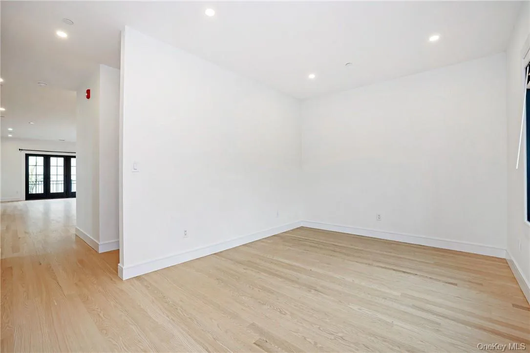 Living room/den/office. Large window looks to the front Living room/den/office. Large window looks to the front