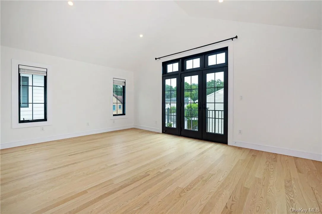Primary Bedroom, french doors to balcony Primary Bedroom, french doors to balcony