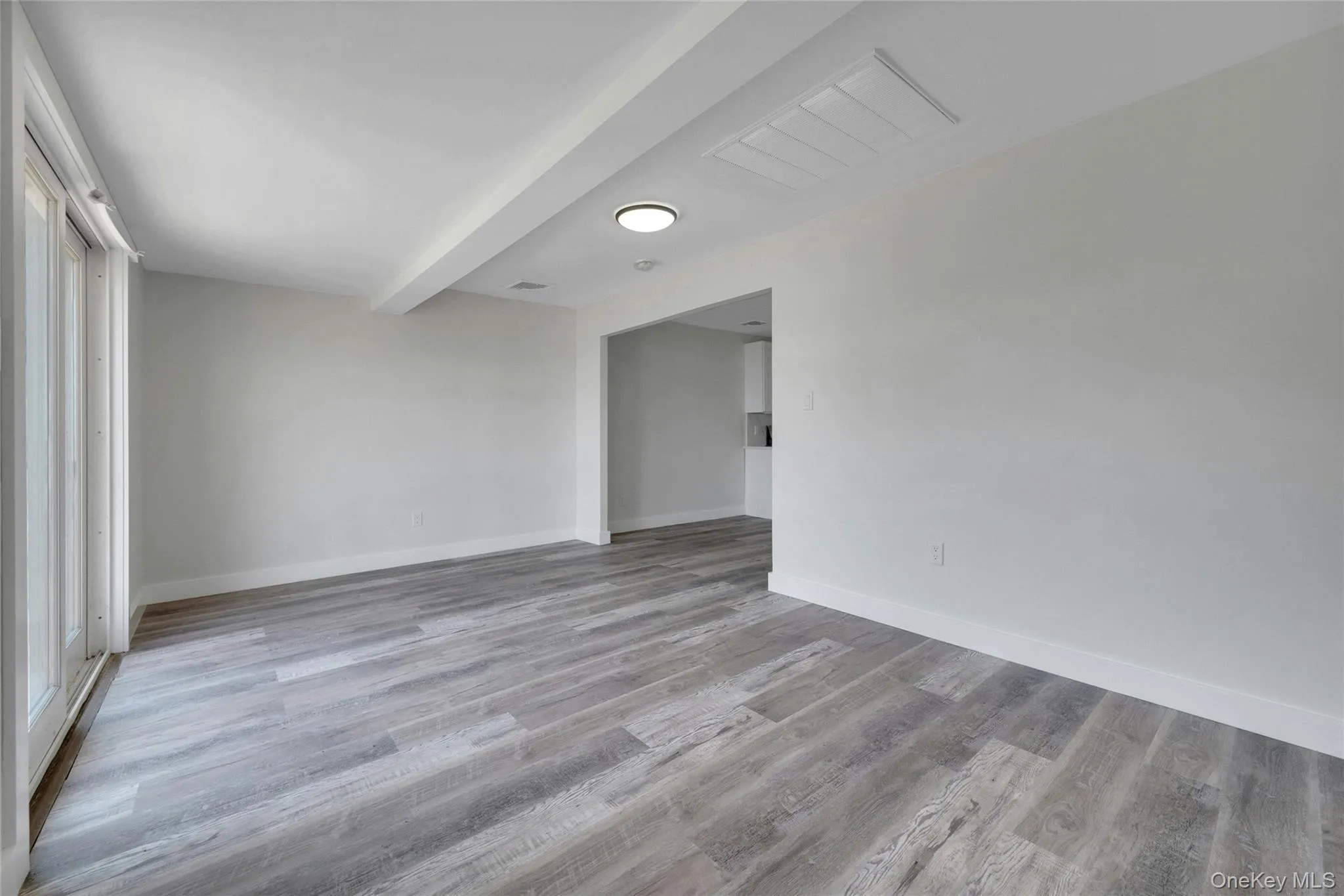 Easy access from kitchen to dining area and sliding glass doors to patio for al fresco dining. Easy access from kitchen to dining area and sliding glass doors to patio for al fresco dining.