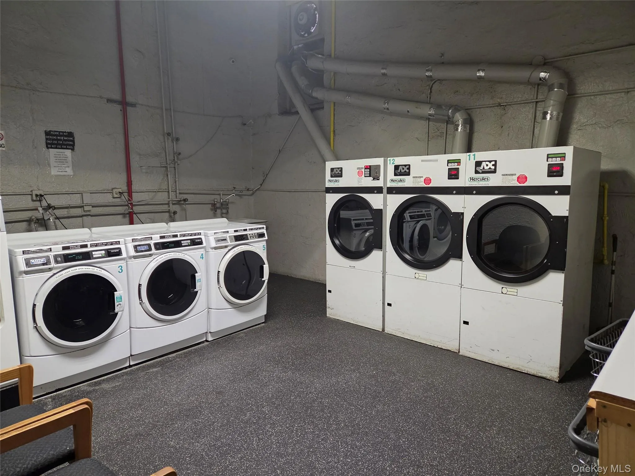 Laundry located in the building Laundry located in the building