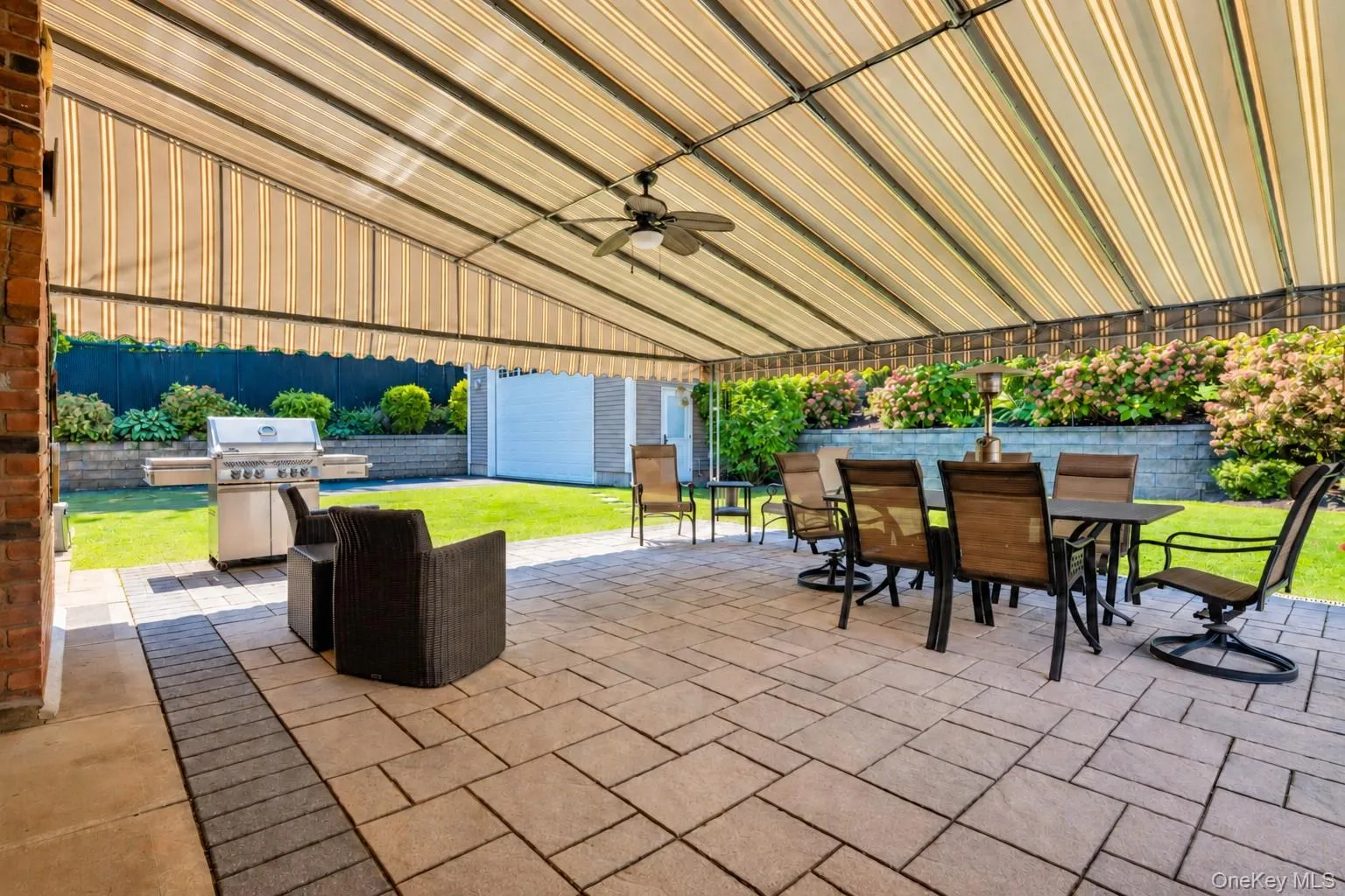 Rear Paver Patio with Awning Above Rear Paver Patio with Awning Above