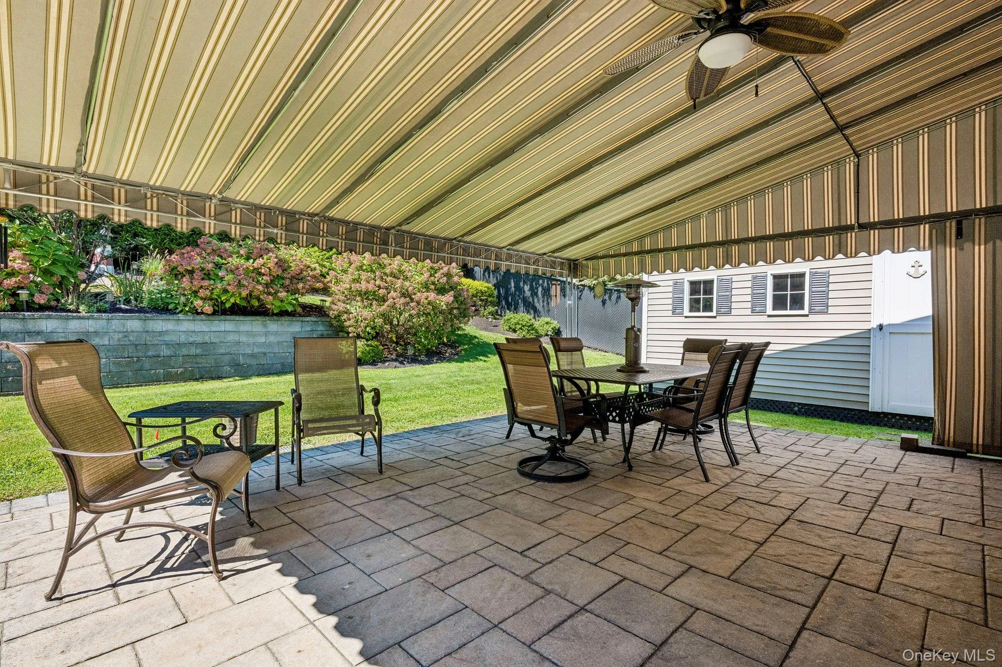 Rear Paver Patio with Awning Above Rear Paver Patio with Awning Above