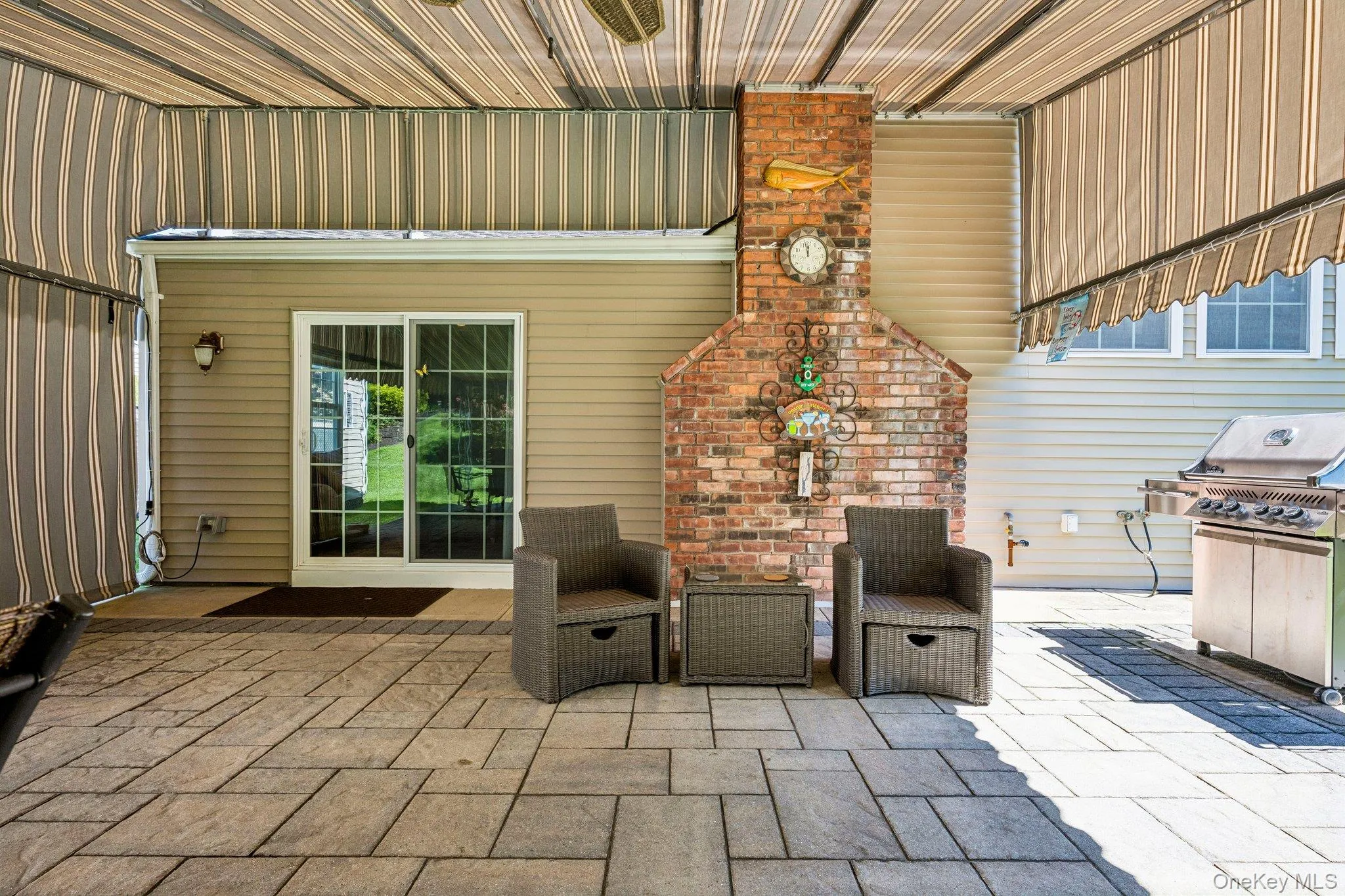 Rear Paver Patio with Access to Family Room Rear Paver Patio with Access to Family Room