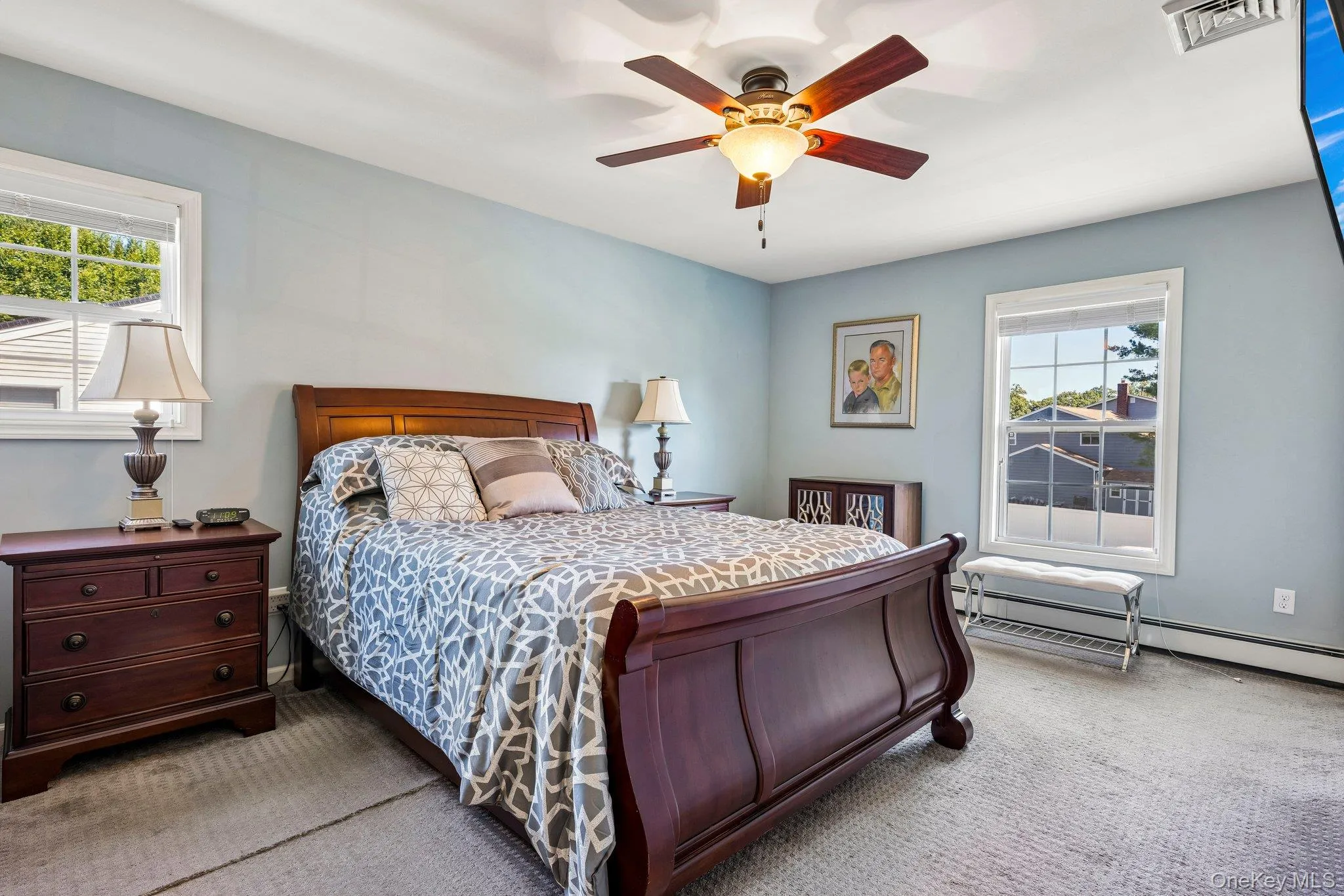 Primary Bedroom with Hardwood Floor under Carpet Primary Bedroom with Hardwood Floor under Carpet