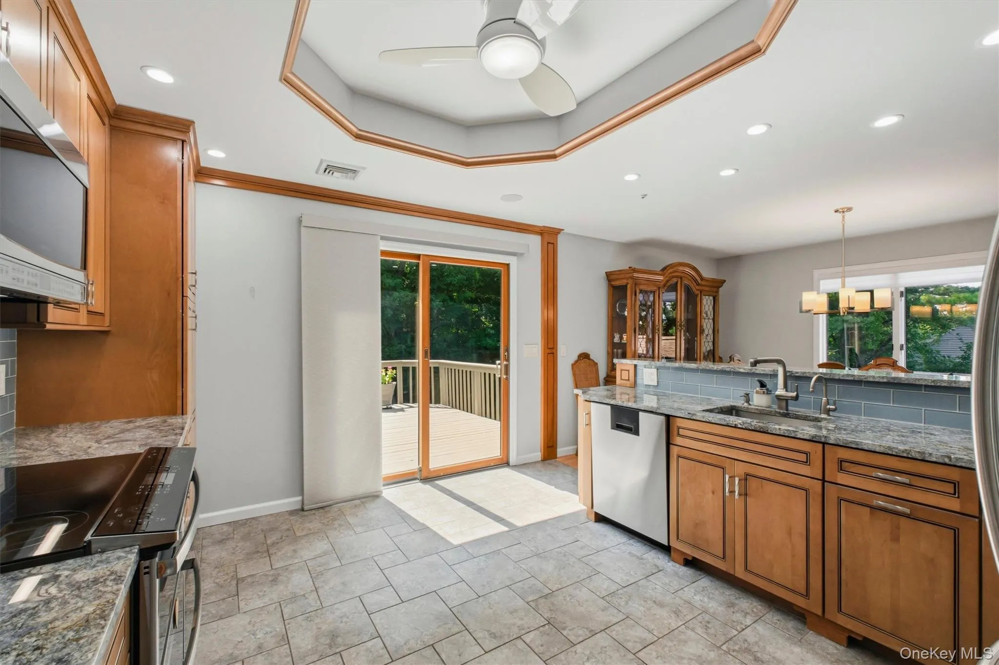 Kitchen walks out to large deck Kitchen walks out to large deck