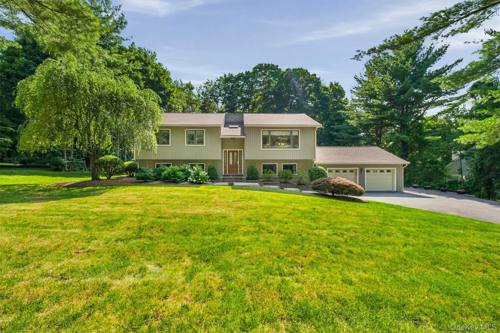 Front walkway and mature landscaping abundant through the property Front walkway and mature landscaping abundant through the property