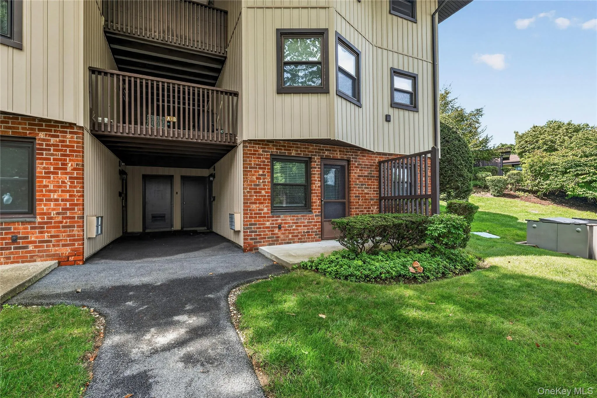 Large patio with front door for easy access from the interior living space Large patio with front door for easy access from the interior living space