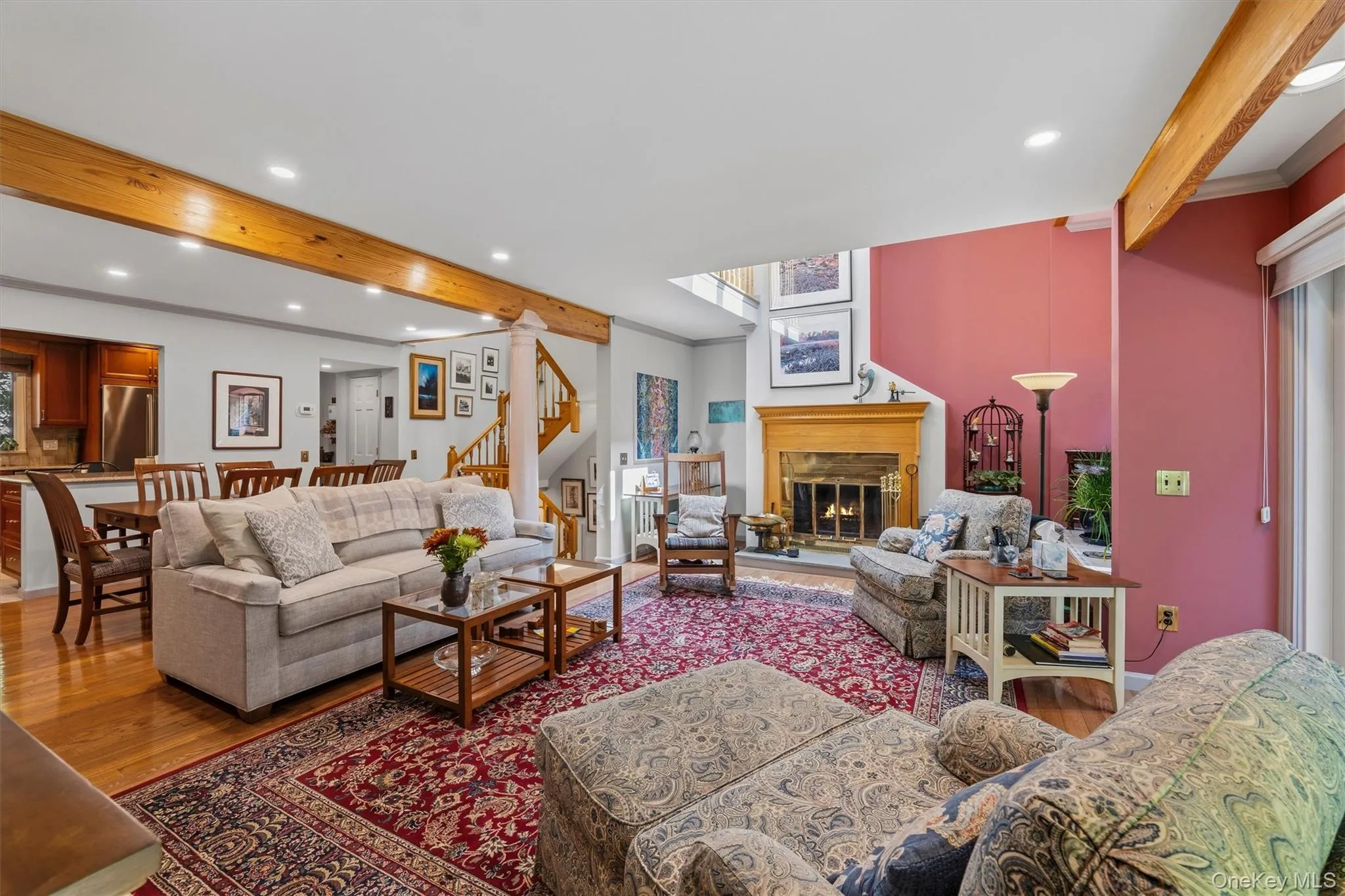 Living room with multiple seating areas. Living room with multiple seating areas.