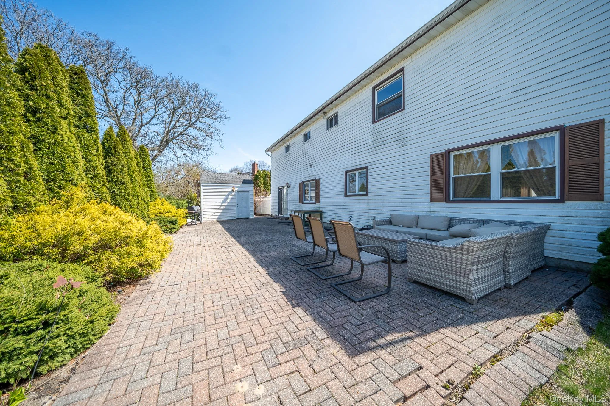 View of patio / terrace featuring an outdoor living space, an outdoor structure, and a storage unit View of patio / terrace featuring an outdoor living space, an outdoor structure, and a storage unit