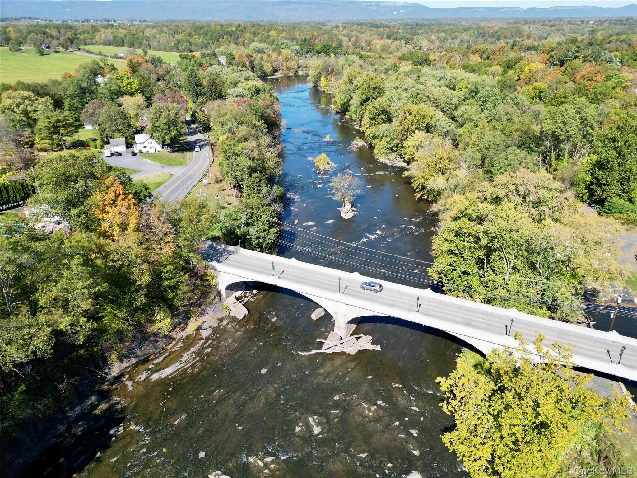 Drone / aerial view with a view of trees and a water view Drone / aerial view with a view of trees and a water view