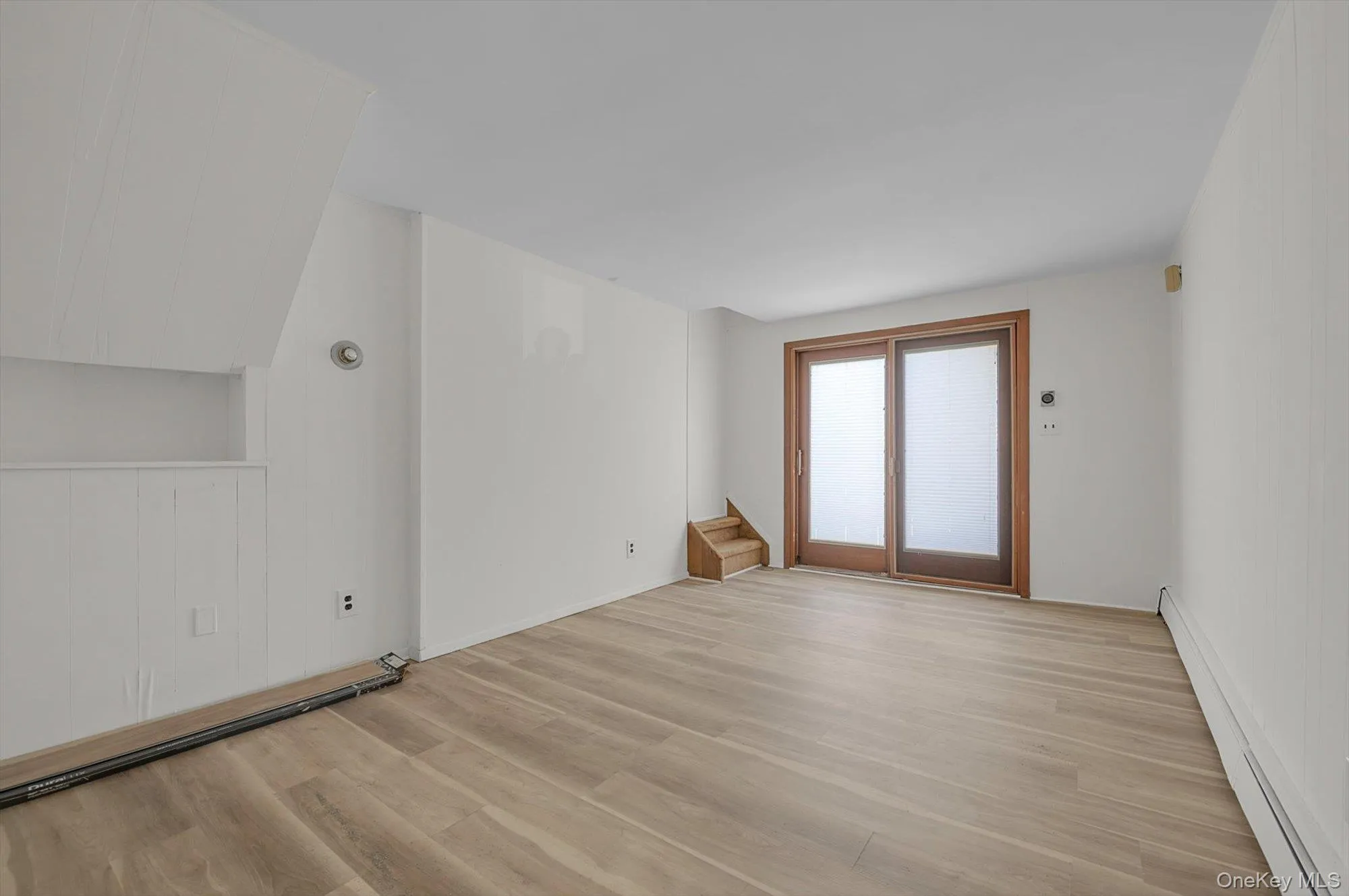 large room with outside exit to backyard large room with outside exit to backyard