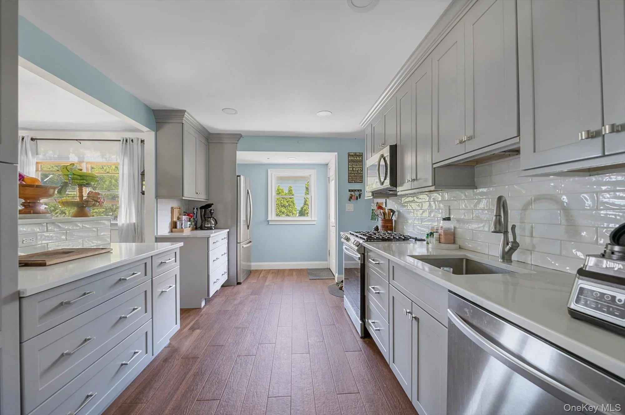 Updated kitchen with outdoor exit to backyard Updated kitchen with outdoor exit to backyard