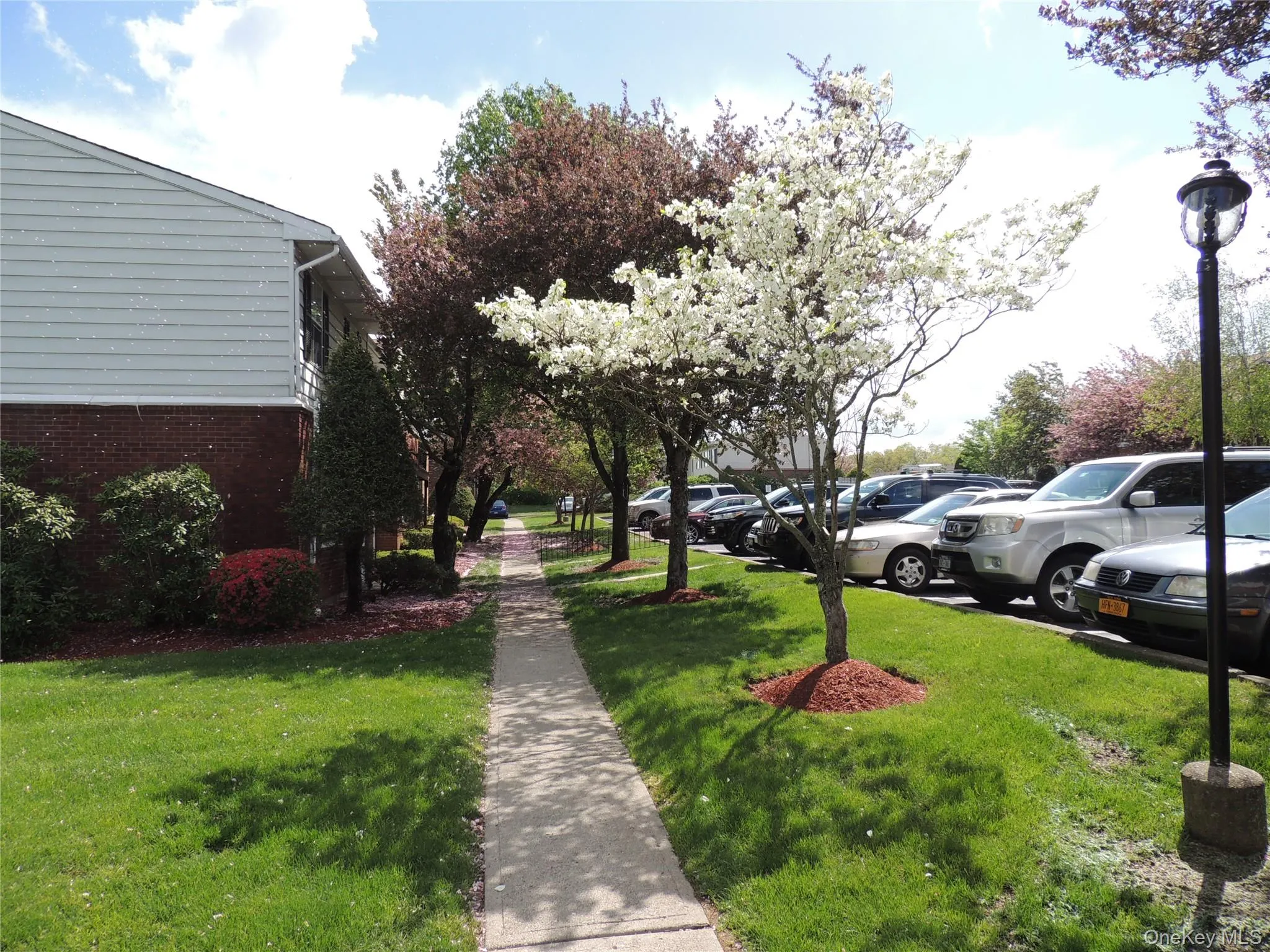 Directly in front of the unit, parking spot #207 is meant for the homeowner only. There are also guest spots. Directly in front of the unit, parking spot #207 is meant for the homeowner only. There are also guest spots.