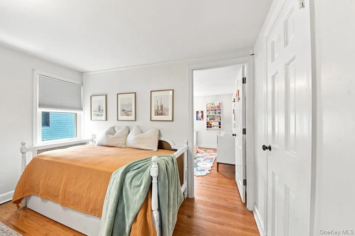 Another view of the Second Bedroom with hardwood flooring. Another view of the Second Bedroom with hardwood flooring.