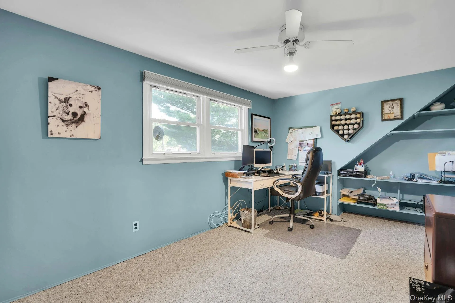 bedroom with built-in shelving. bedroom with built-in shelving.