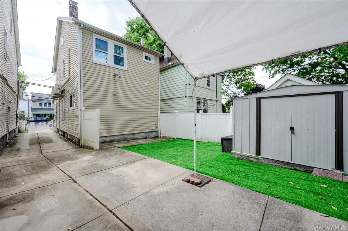 Rear yard, driveway for 4+ cars and storage shed Rear yard, driveway for 4+ cars and storage shed