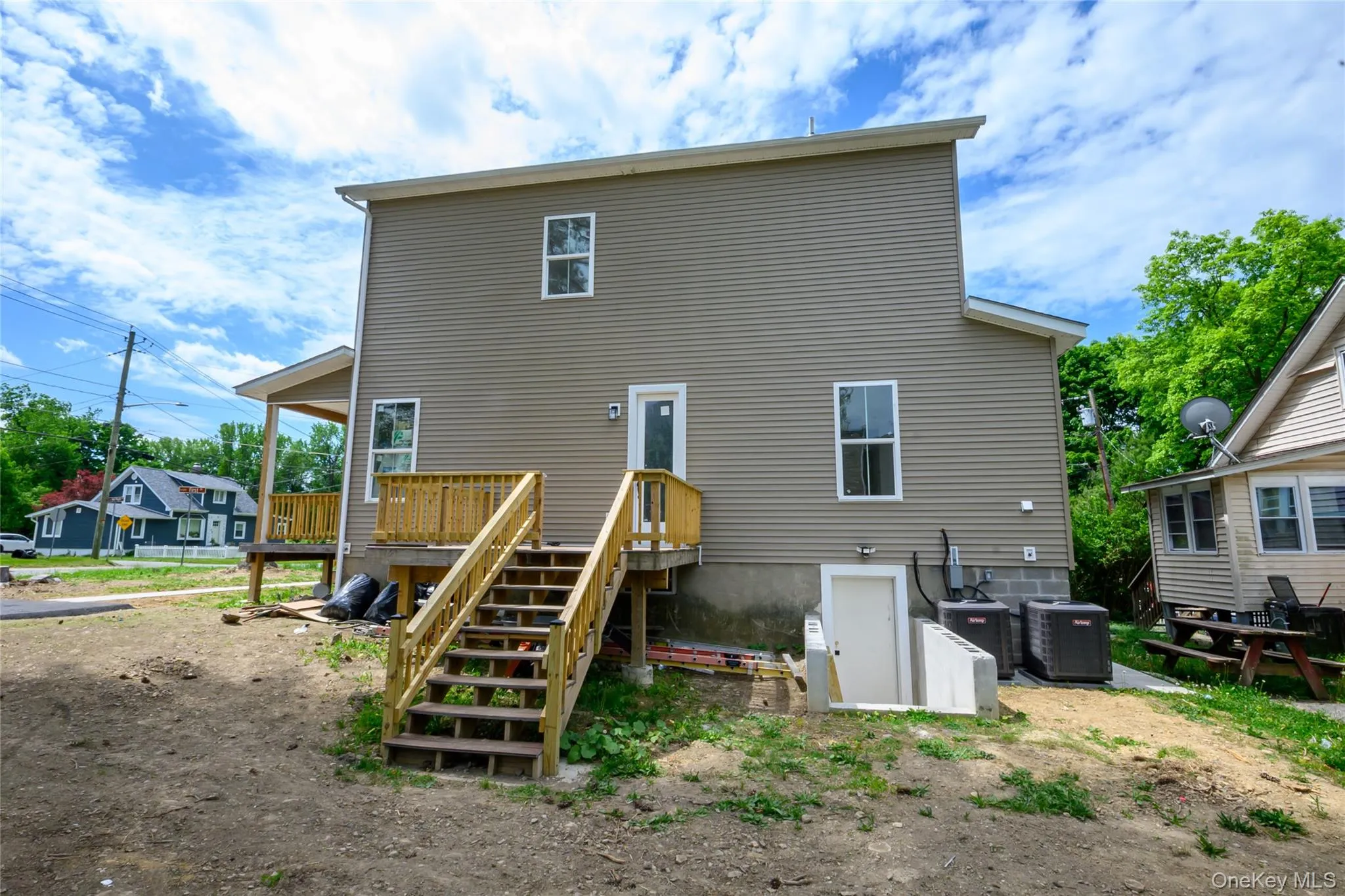 Side of the house with deck Side of the house with deck