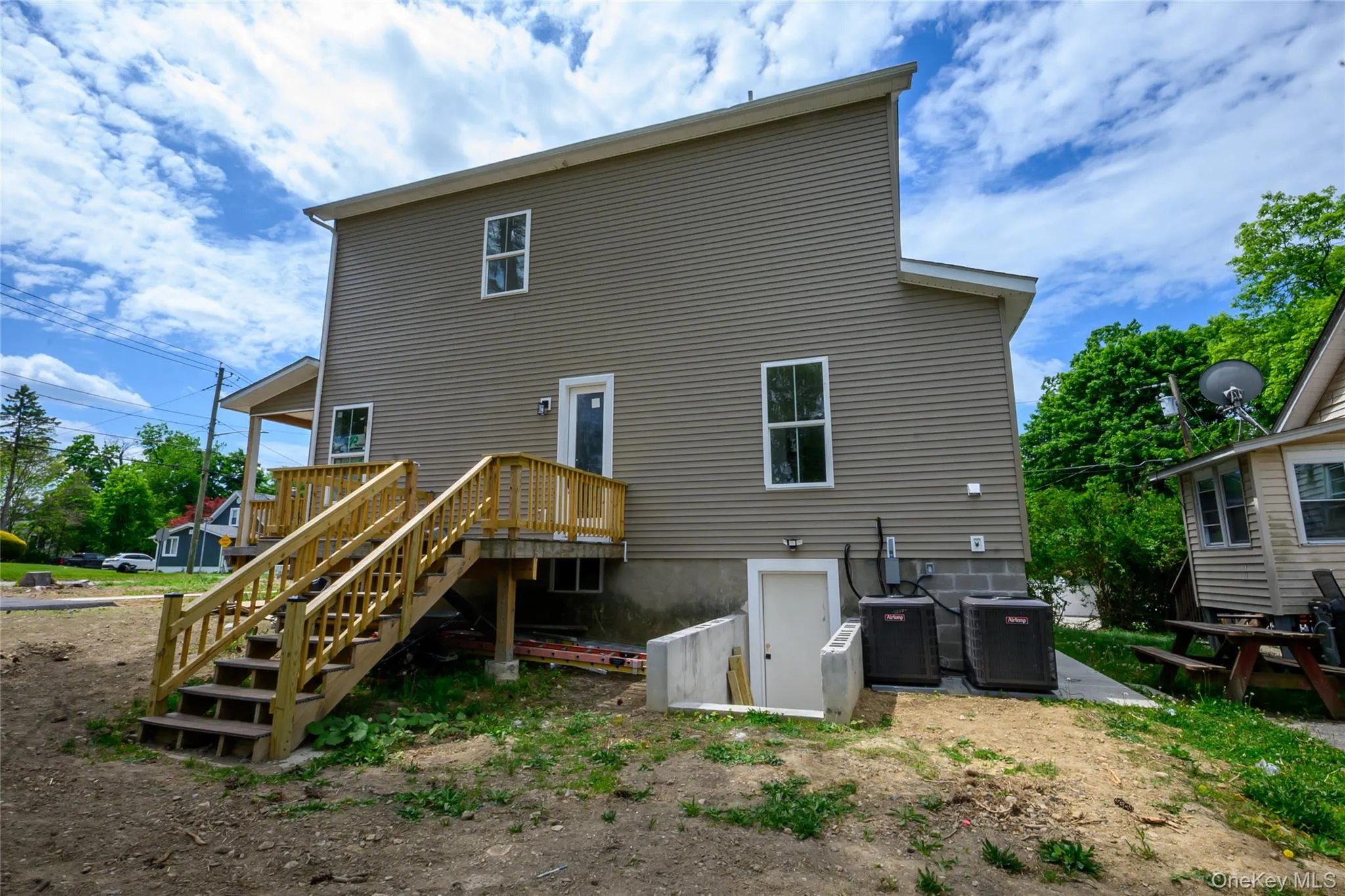 Side of the house with basement access Side of the house with basement access