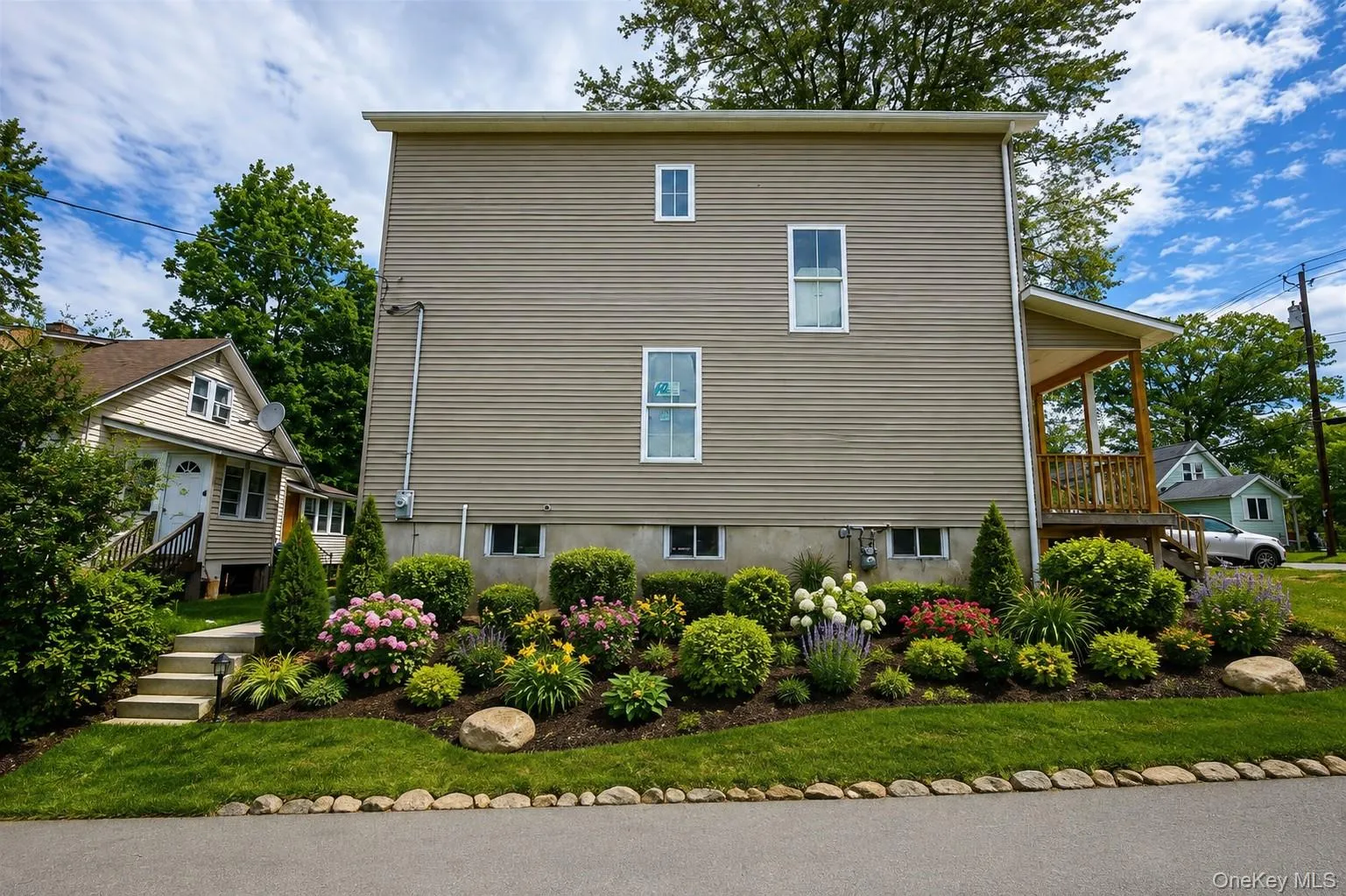 Side of the home Virtually enhanced to show the potential curb appeal with a little landscaping Side of the home Virtually enhanced to show the potential curb appeal with a little landscaping