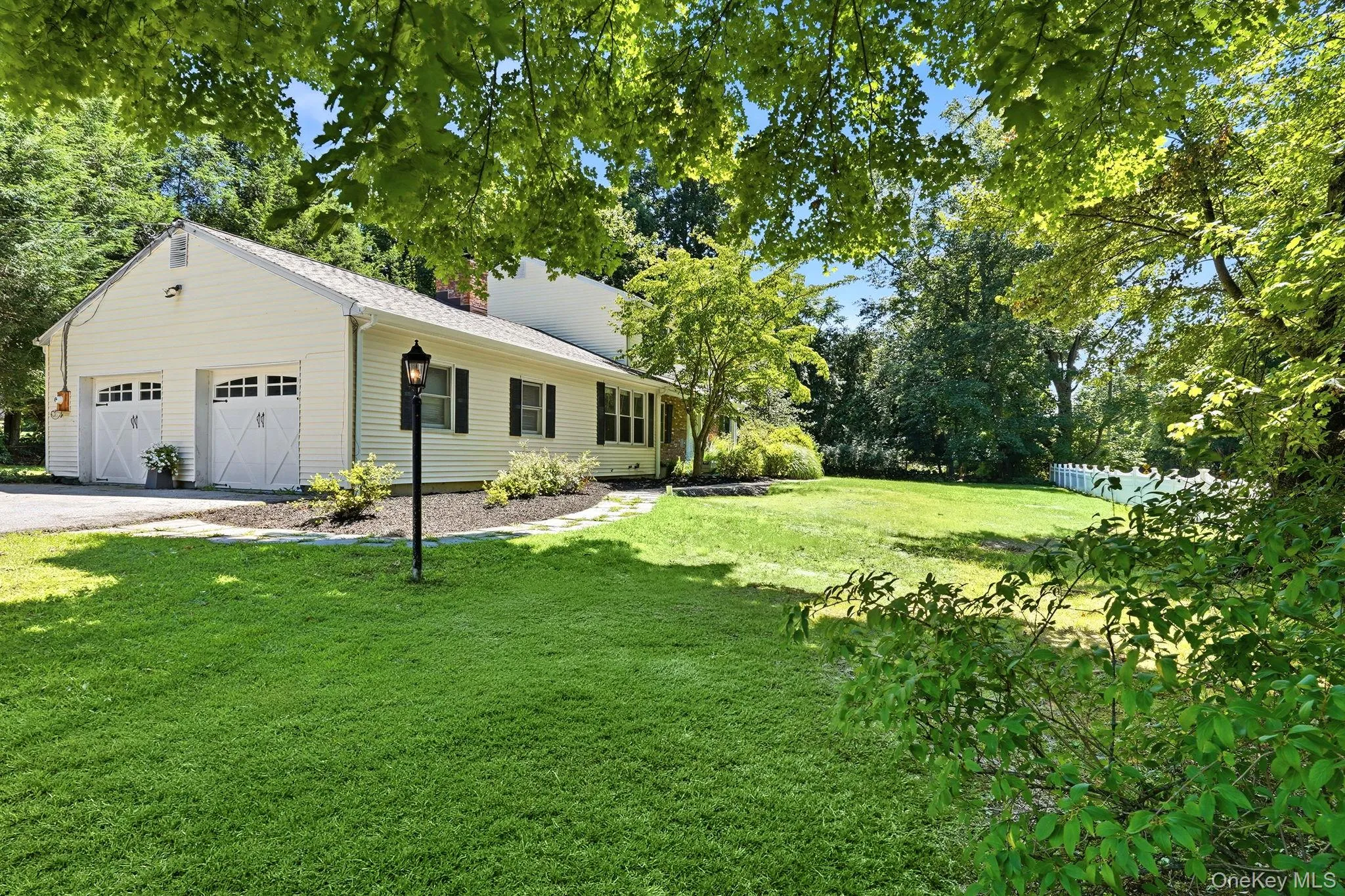 Front yard showing 2 car garage Front yard showing 2 car garage