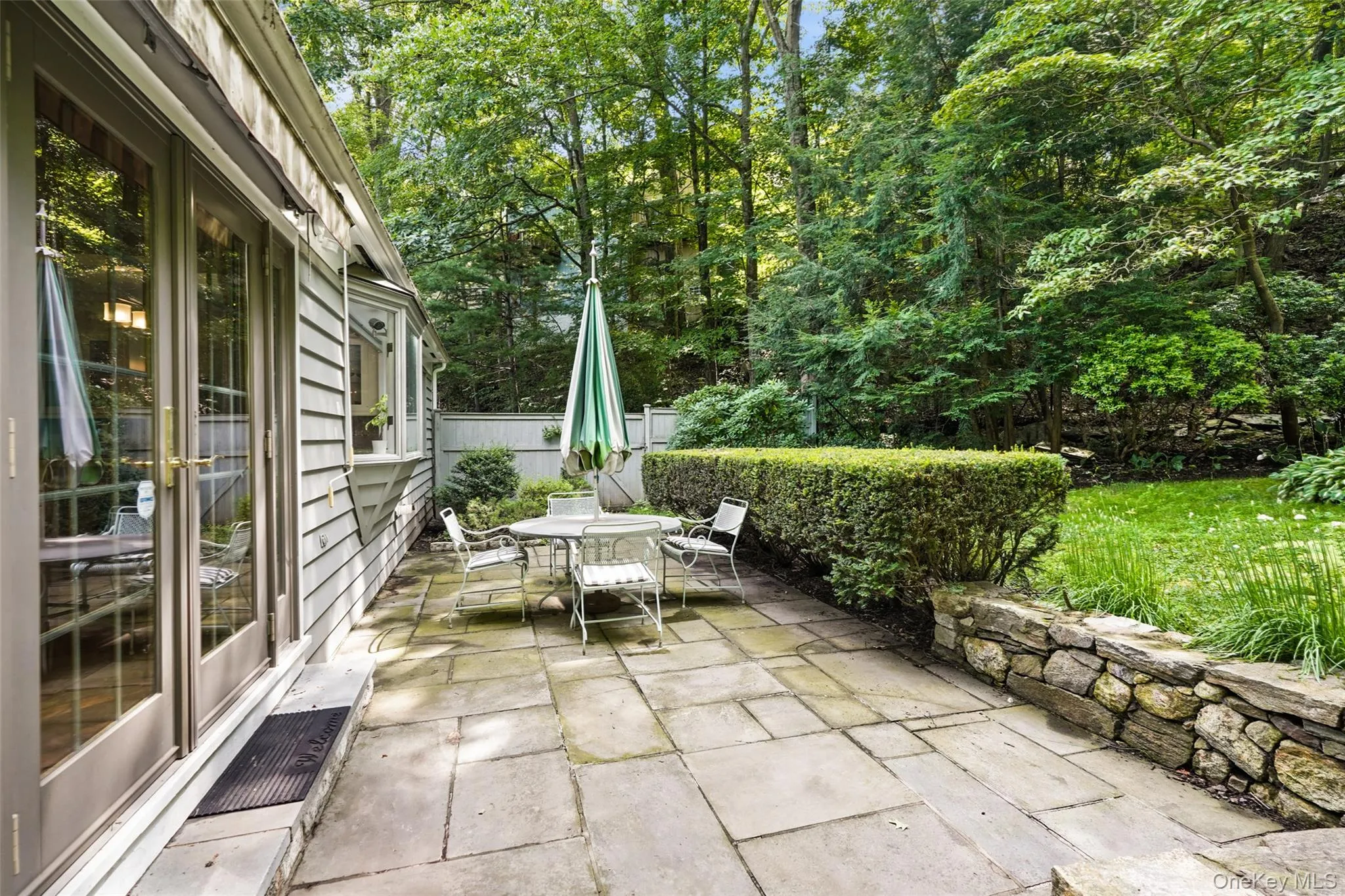 Secluded patio for quiet relaxation or gatherings with family and friends Secluded patio for quiet relaxation or gatherings with family and friends