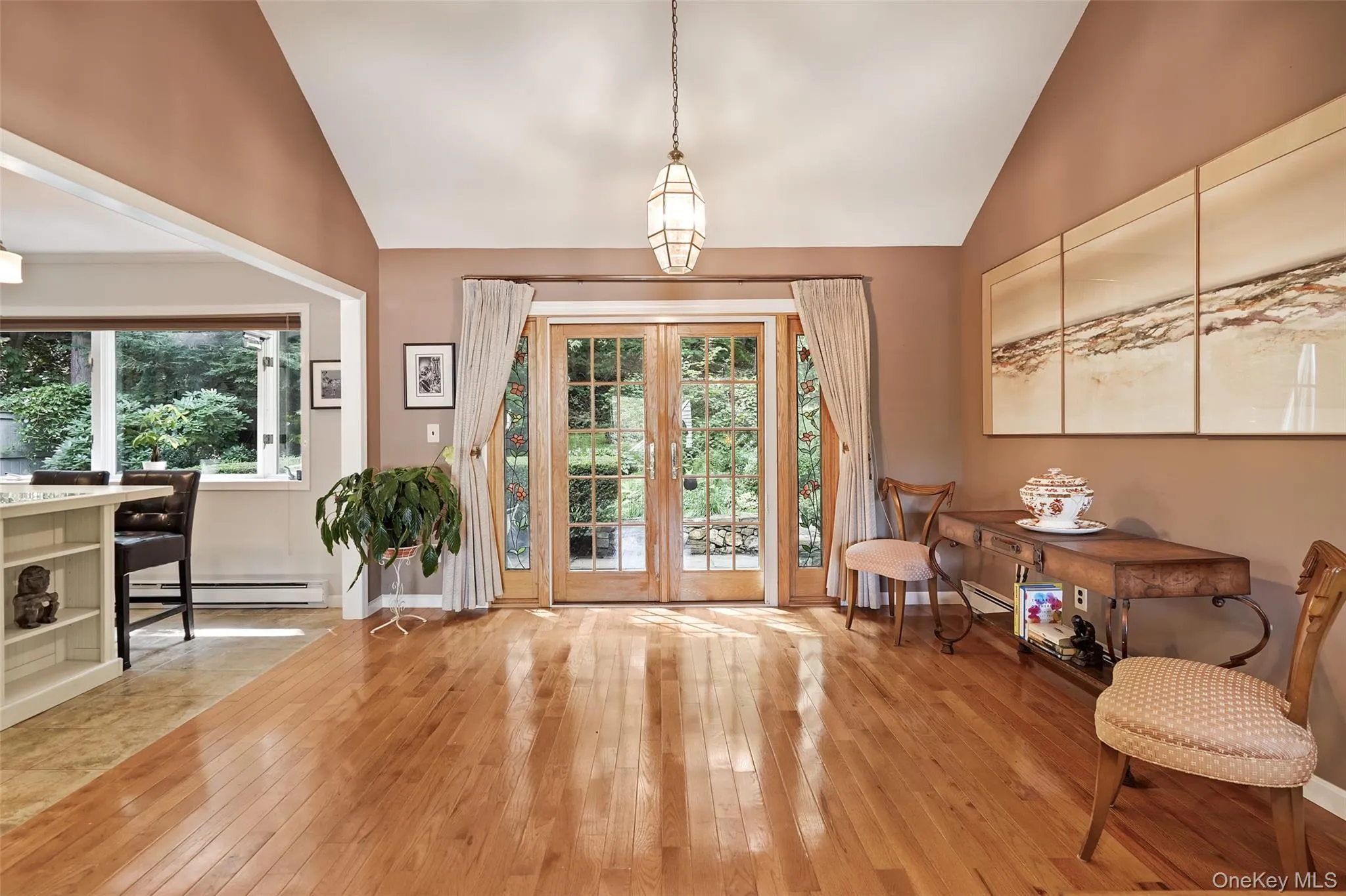 Dining area opens to kitchen and French doors to patio Dining area opens to kitchen and French doors to patio