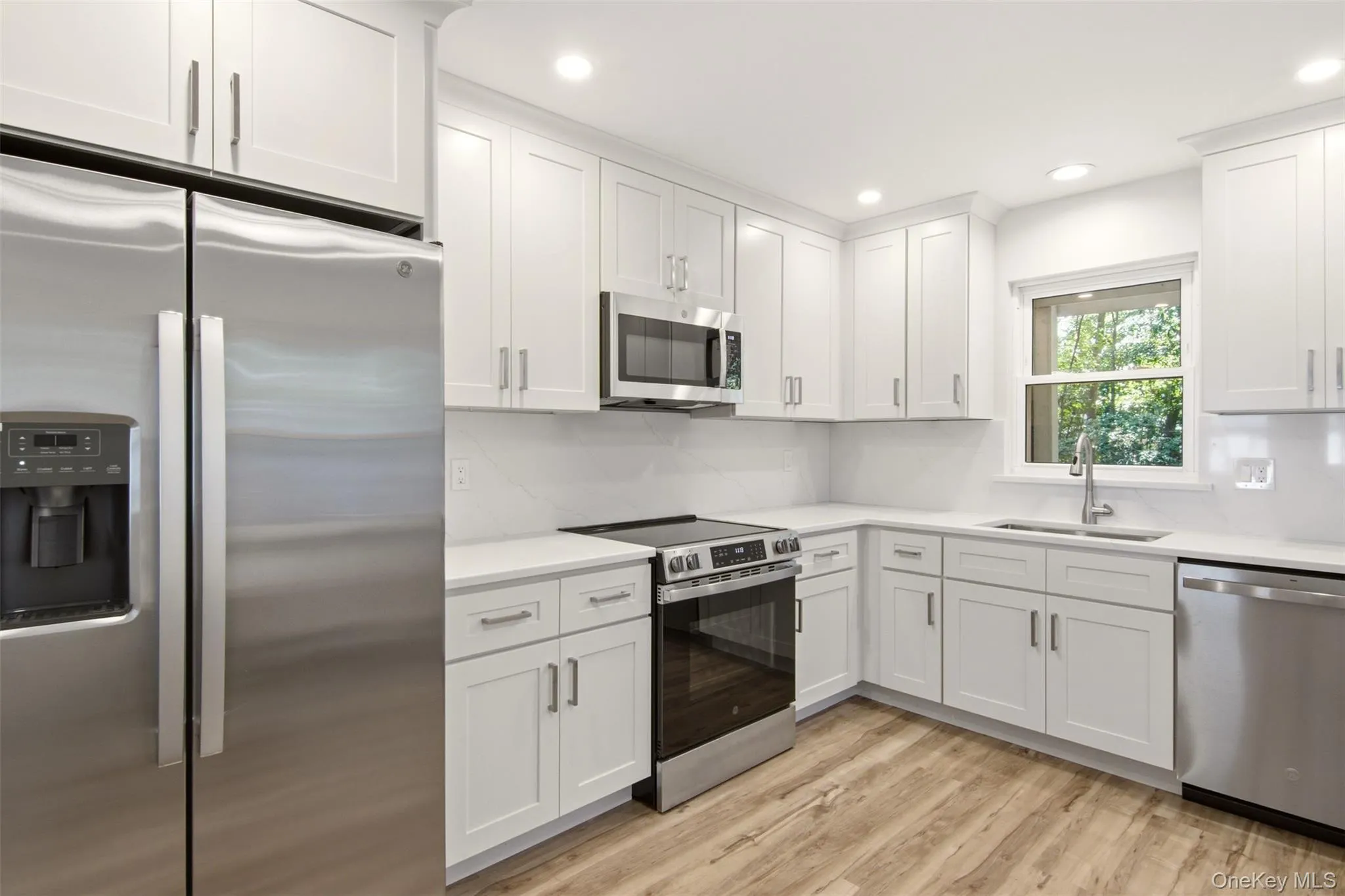 Brand new kitchen with stainless steel appliances Brand new kitchen with stainless steel appliances