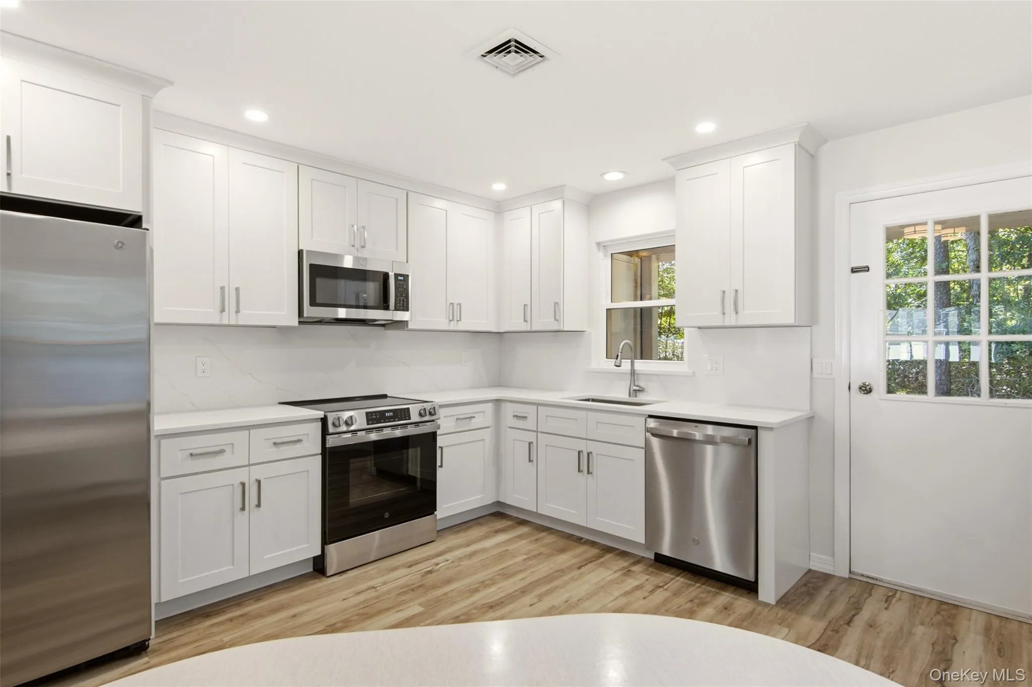 Brand new kitchen with stainless steel appliances Brand new kitchen with stainless steel appliances