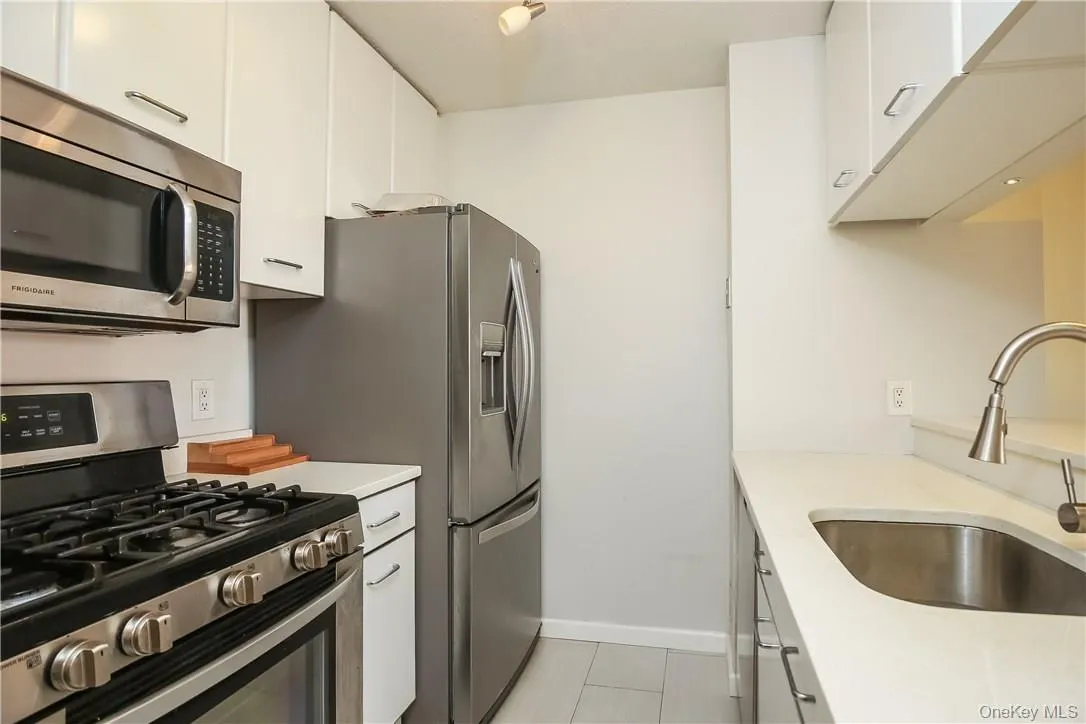 Kitchen with stainless steel appliances Kitchen with stainless steel appliances