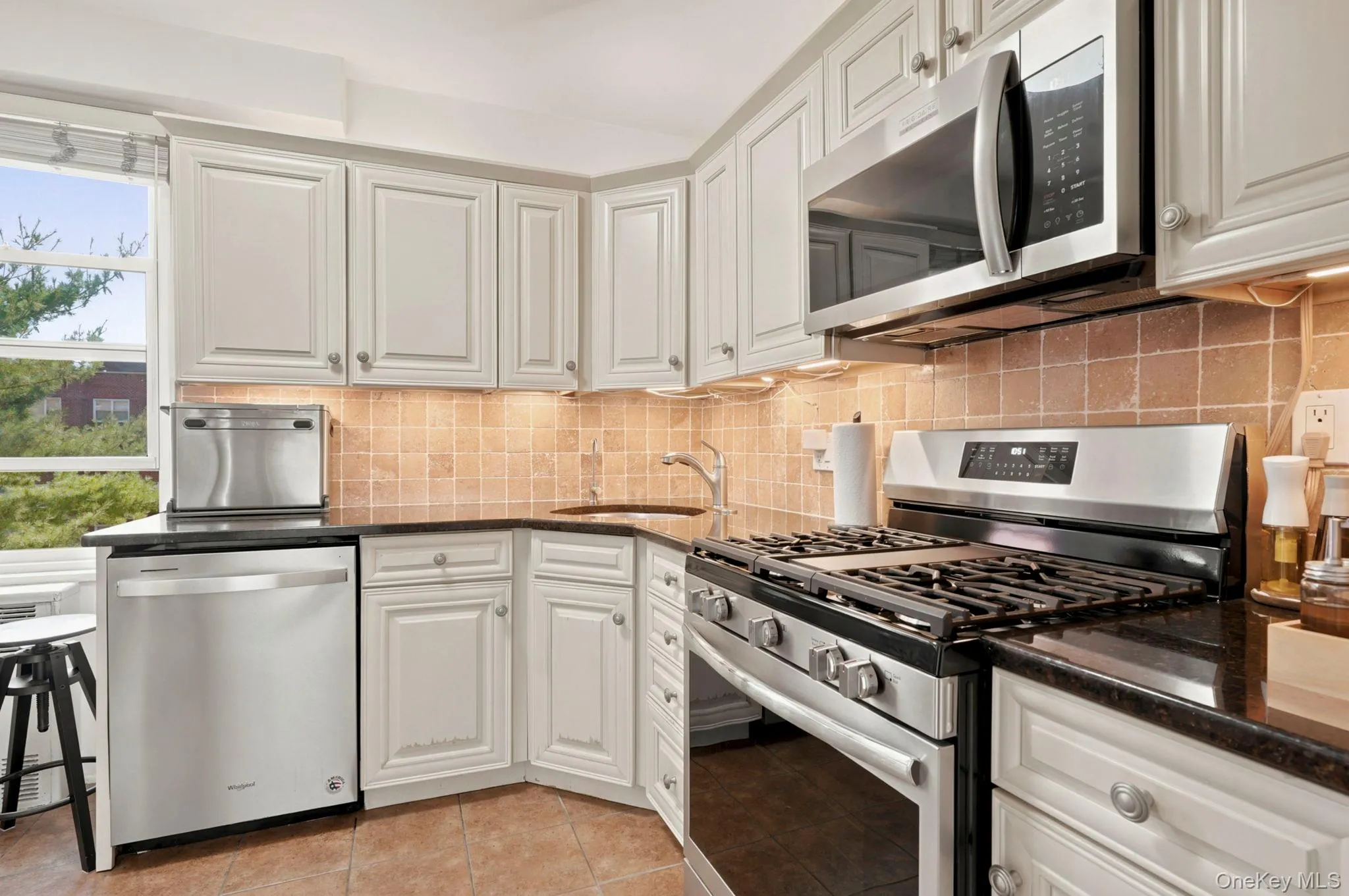 Updated kitchen with stainless steel appliances. Updated kitchen with stainless steel appliances.