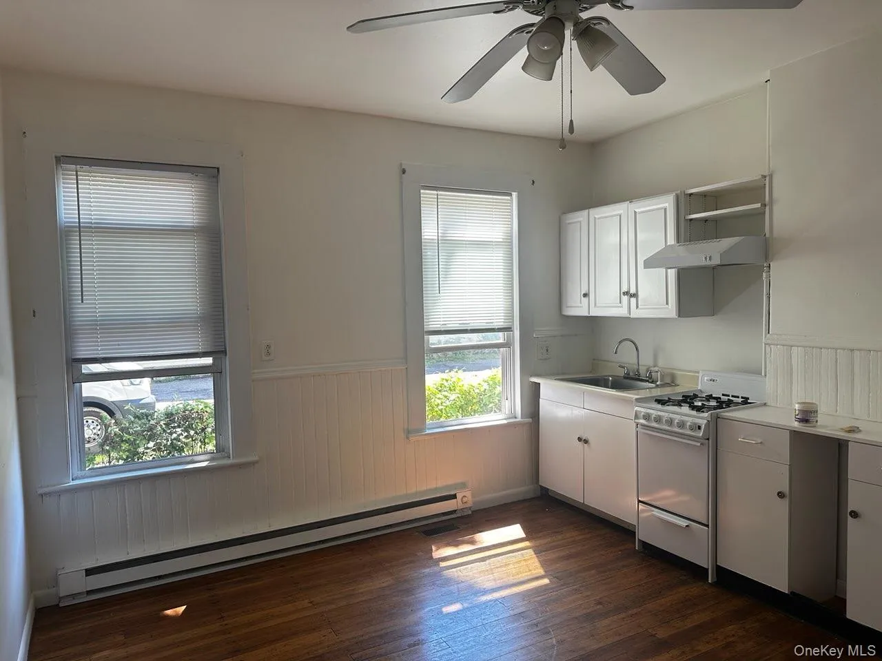Sun-kissed eat in kitchen, hard wood floors, ceiling fan Sun-kissed eat in kitchen, hard wood floors, ceiling fan