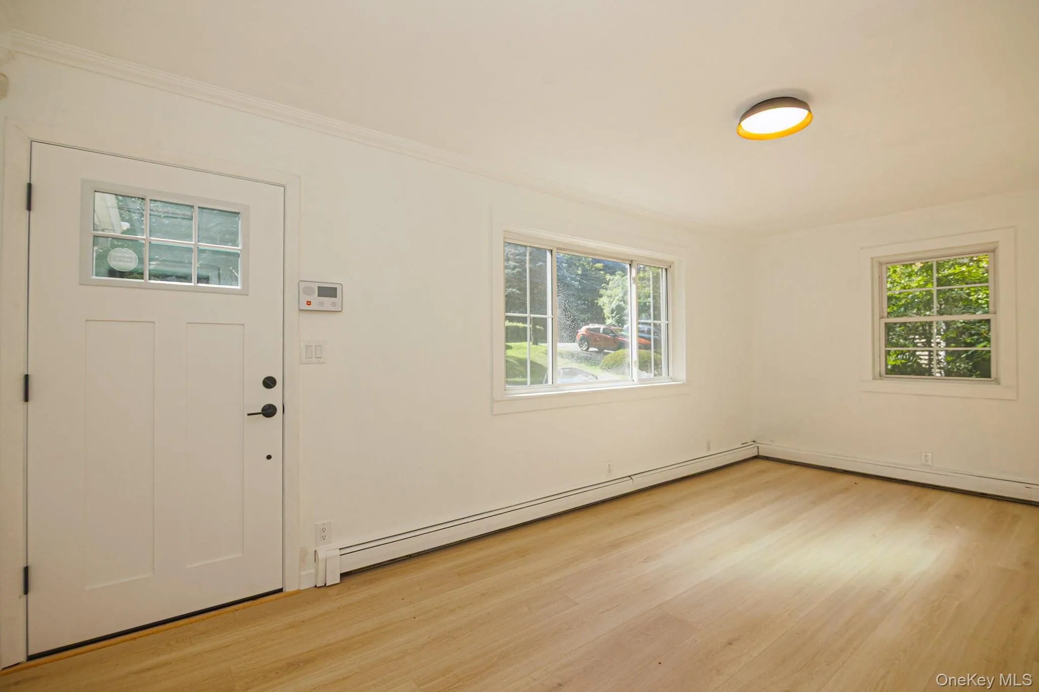 New flooring and front door. New flooring and front door.